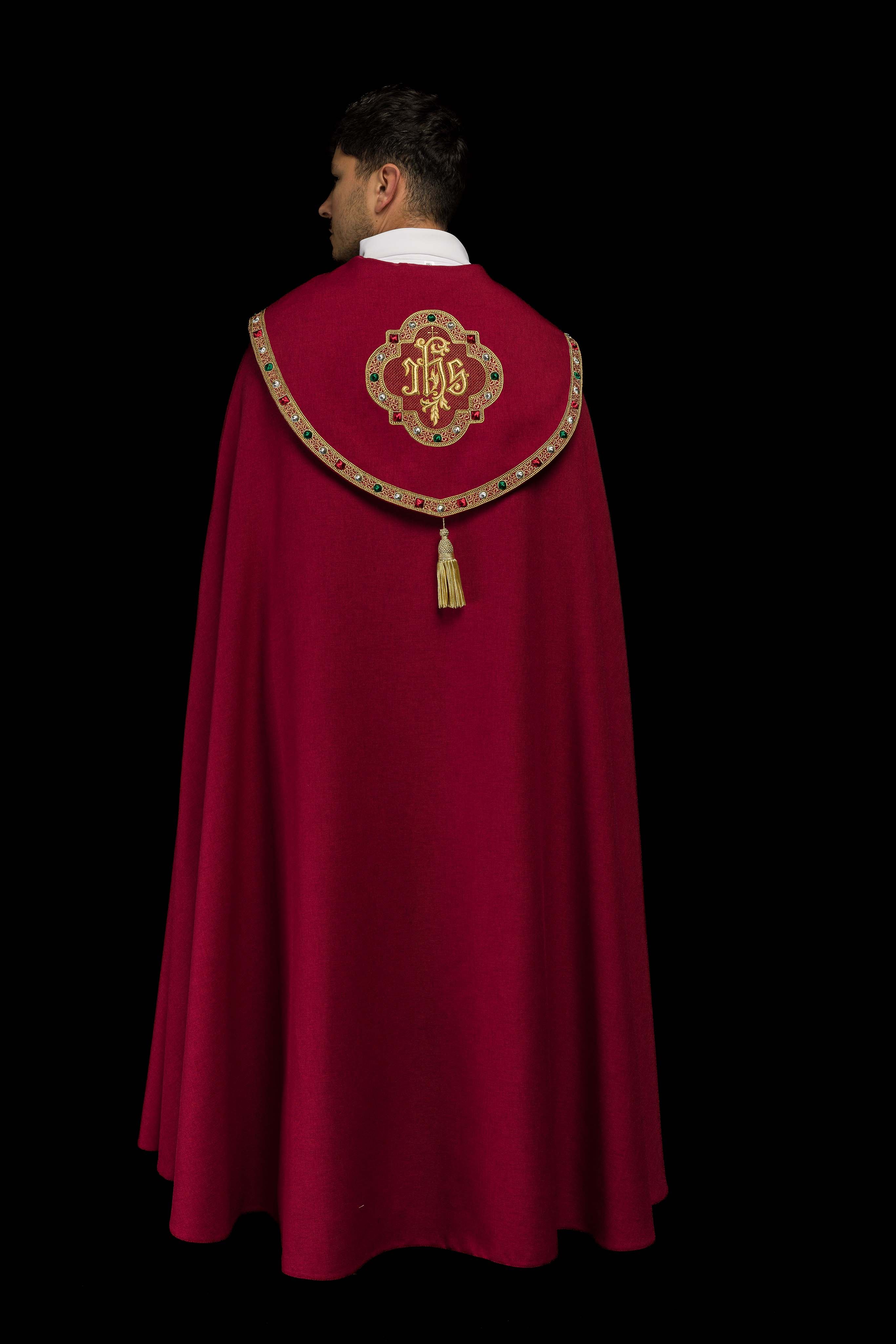 Liturgical cope in red finished with JHS embroidery