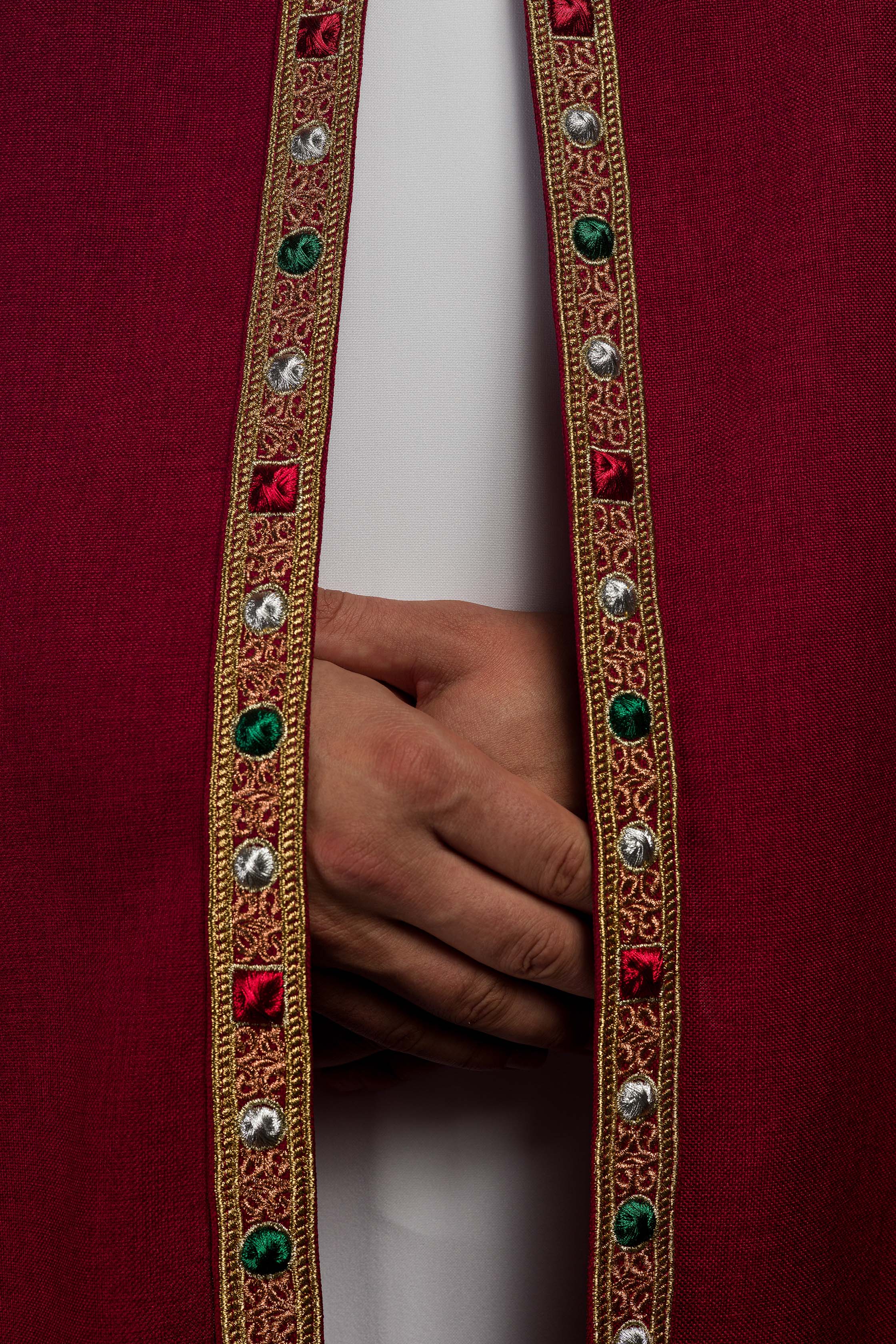Liturgical cope in red finished with JHS embroidery