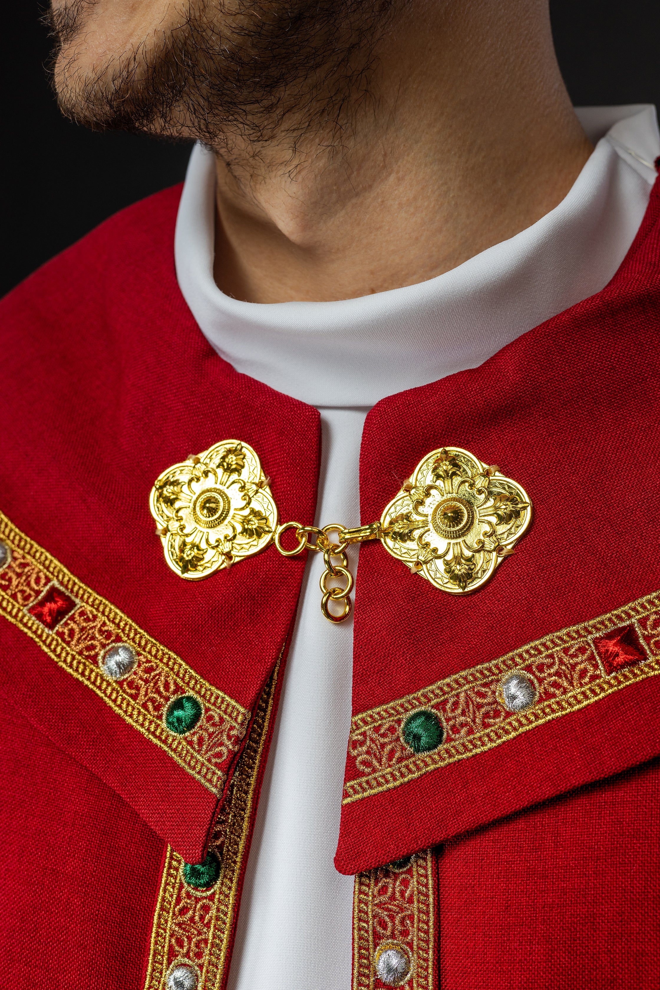 Liturgical cope in red finished with JHS embroidery