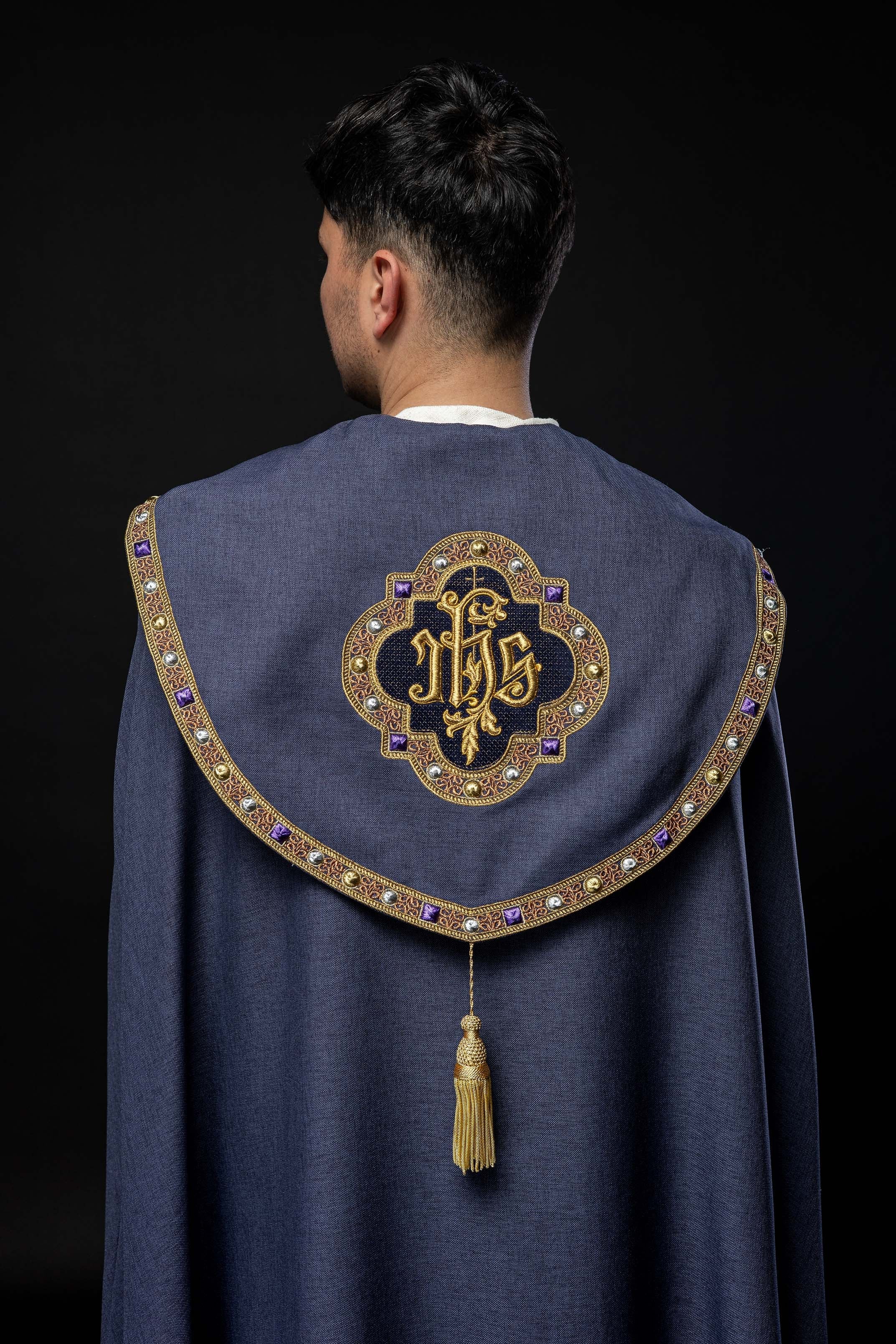 Purple liturgical cape with gold IHS