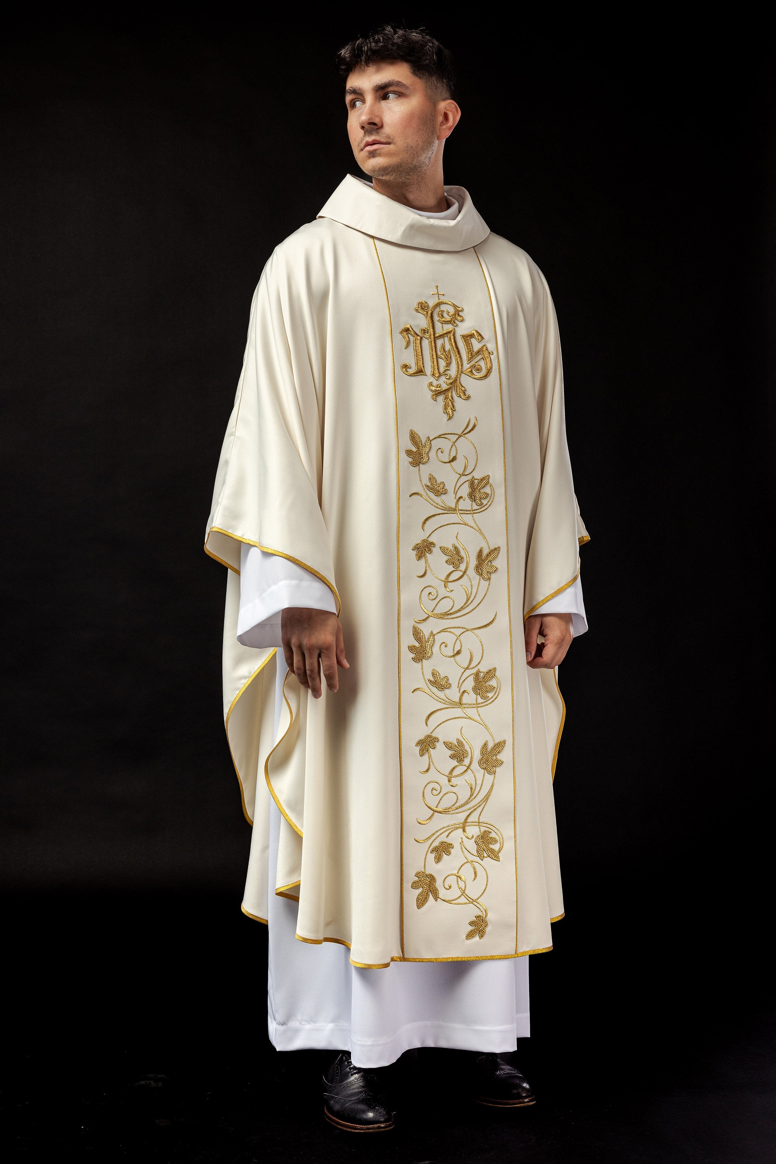 Ecru liturgical chasuble with richly decorated belt with floral motif and IHS