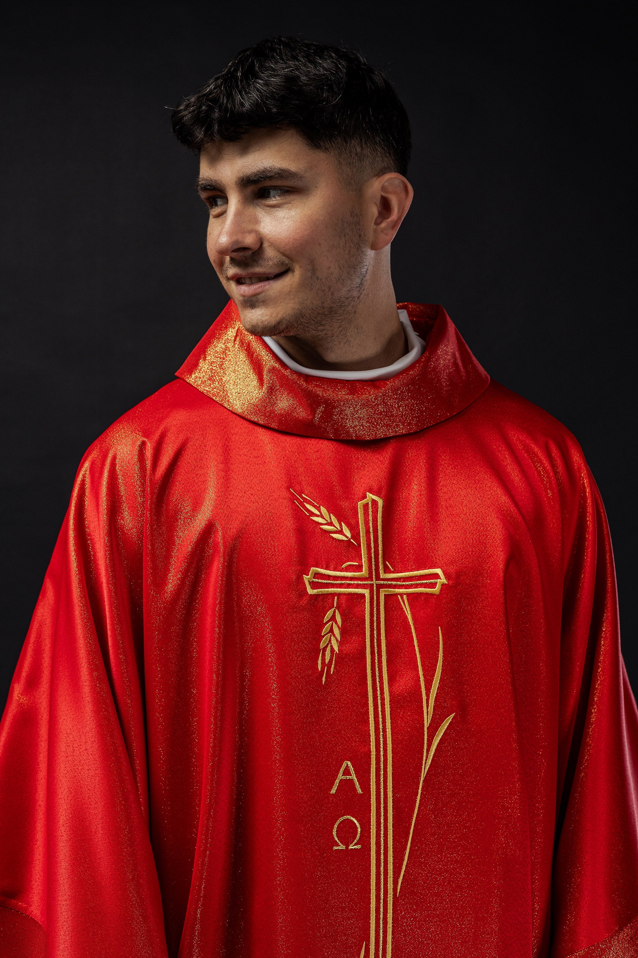 Chasuble with cross and ear motif in red color