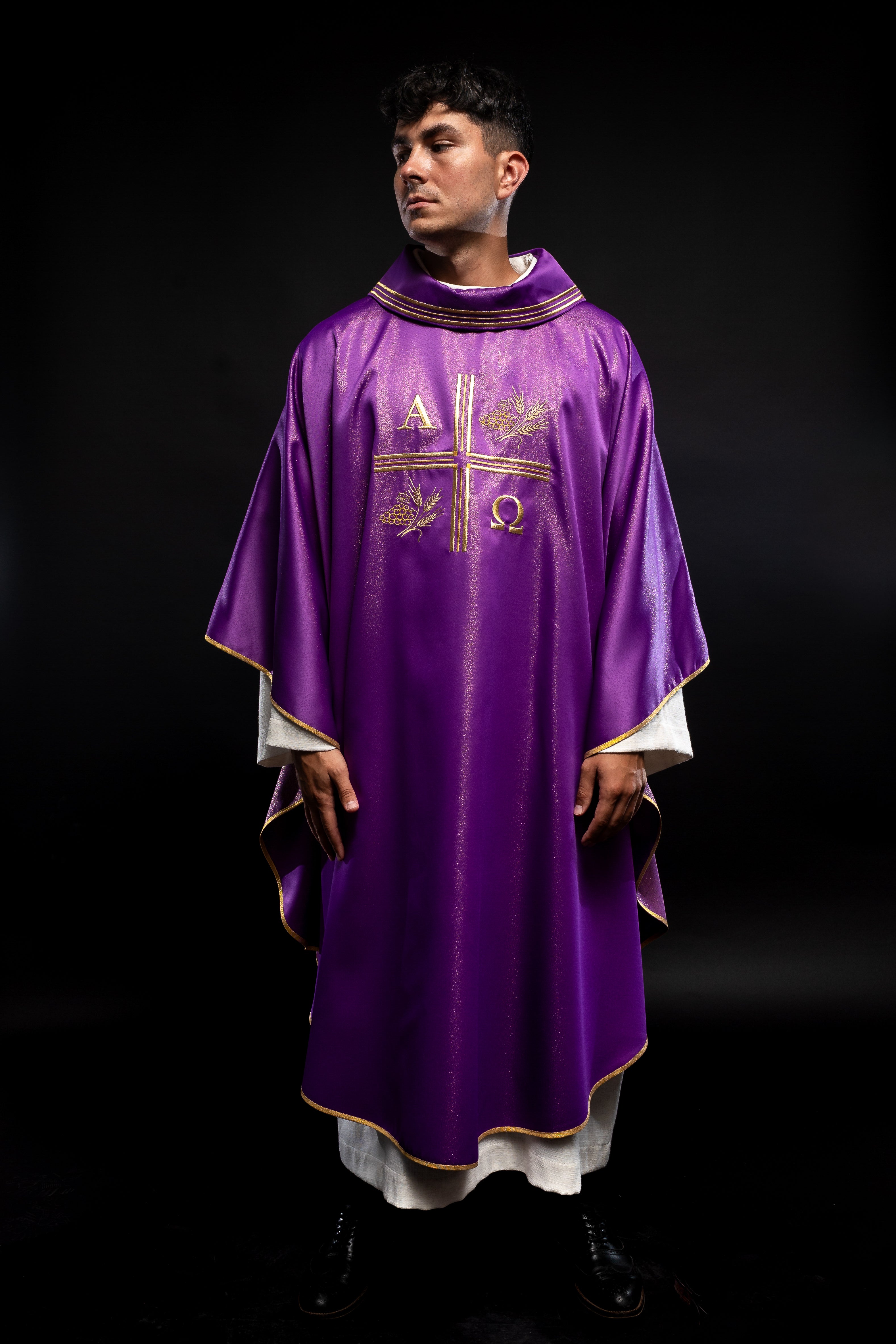 Purple chasuble made of glittery texture with Alpha, Omega, Cross and Wheat motifs