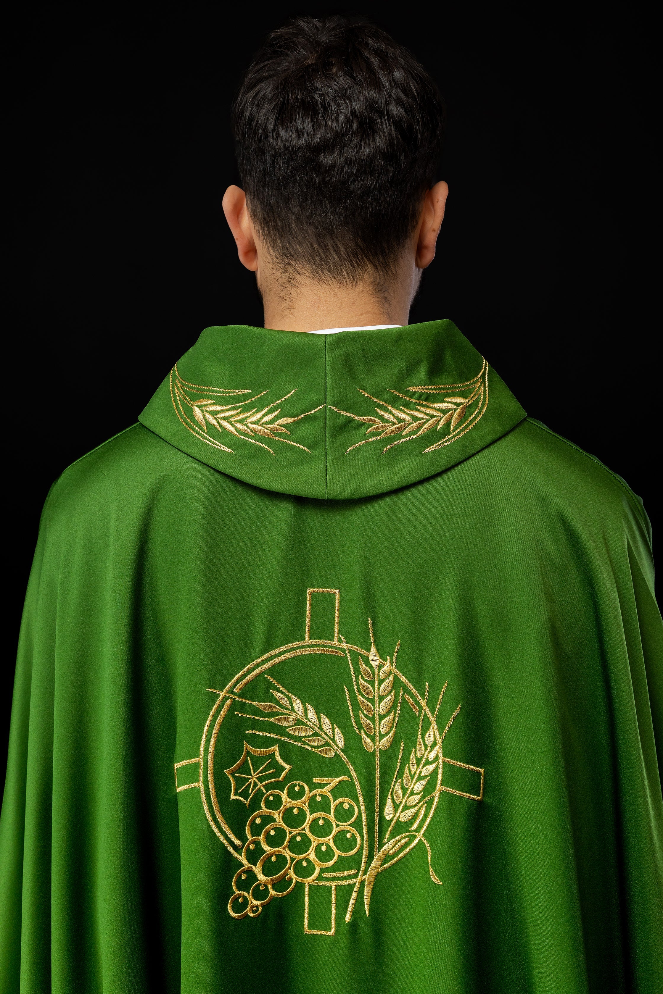 Green chasuble with embroidered collar and cross and wheat motifs