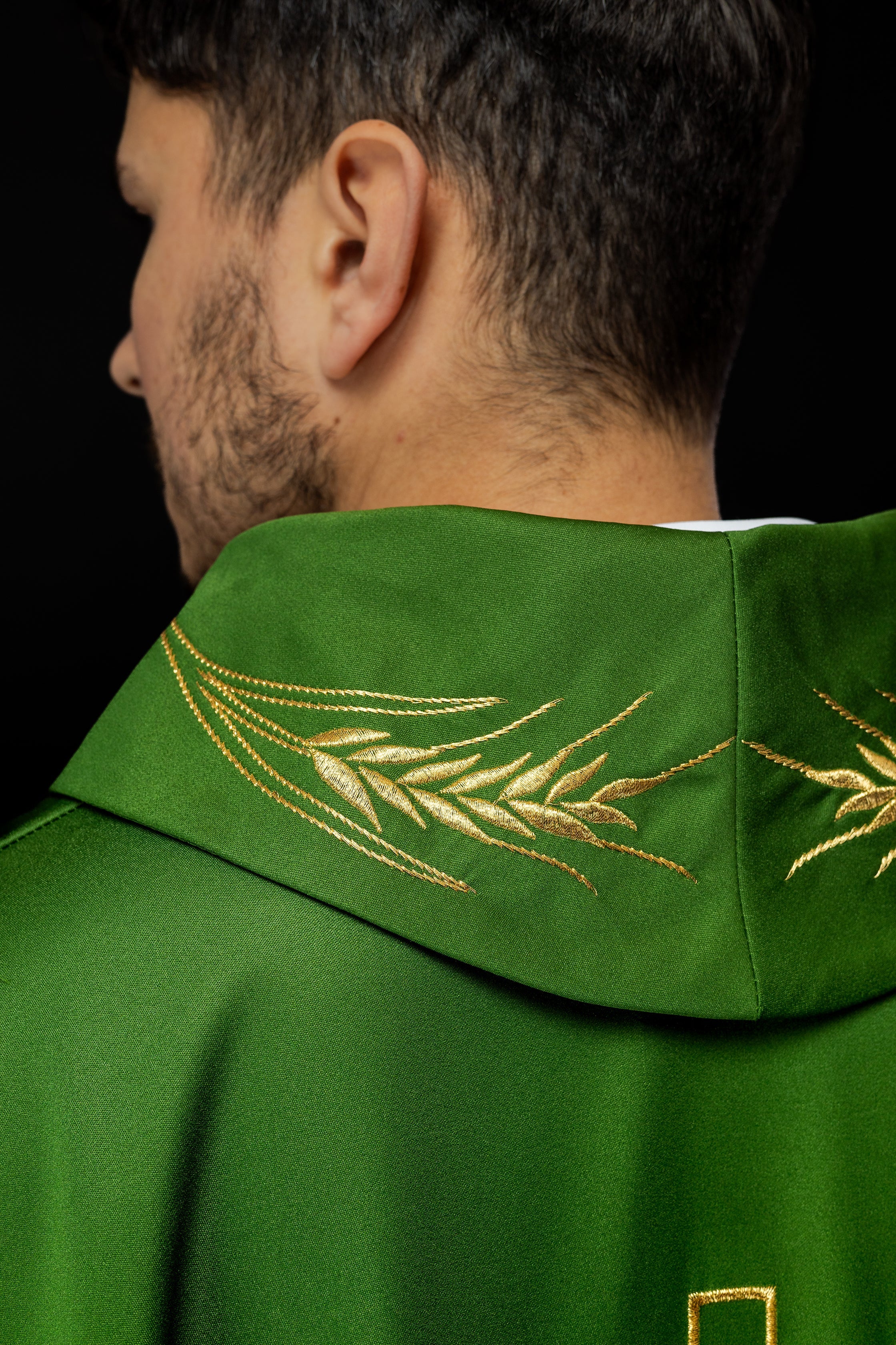 Green chasuble with embroidered collar and cross and wheat motifs