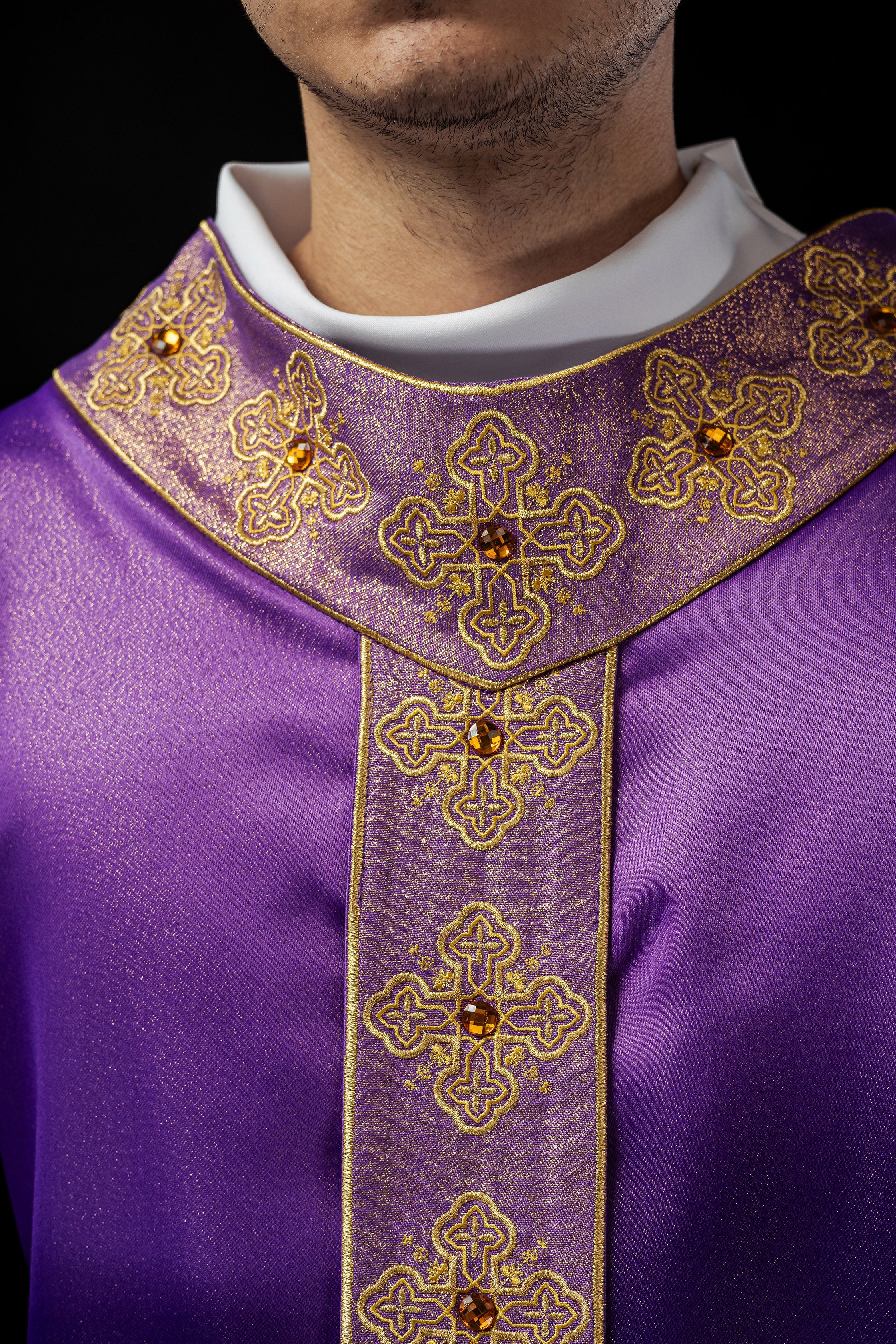 Purple catlholic chasuble with embroidered belt and collar decorated with stones