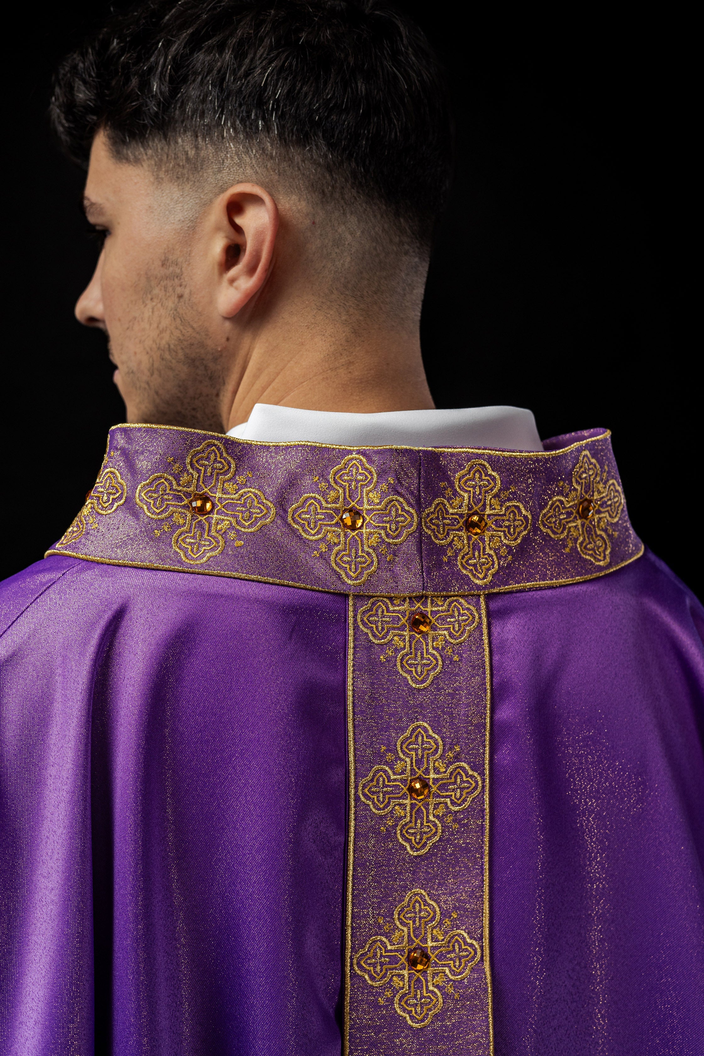 Purple catlholic chasuble with embroidered belt and collar decorated with stones