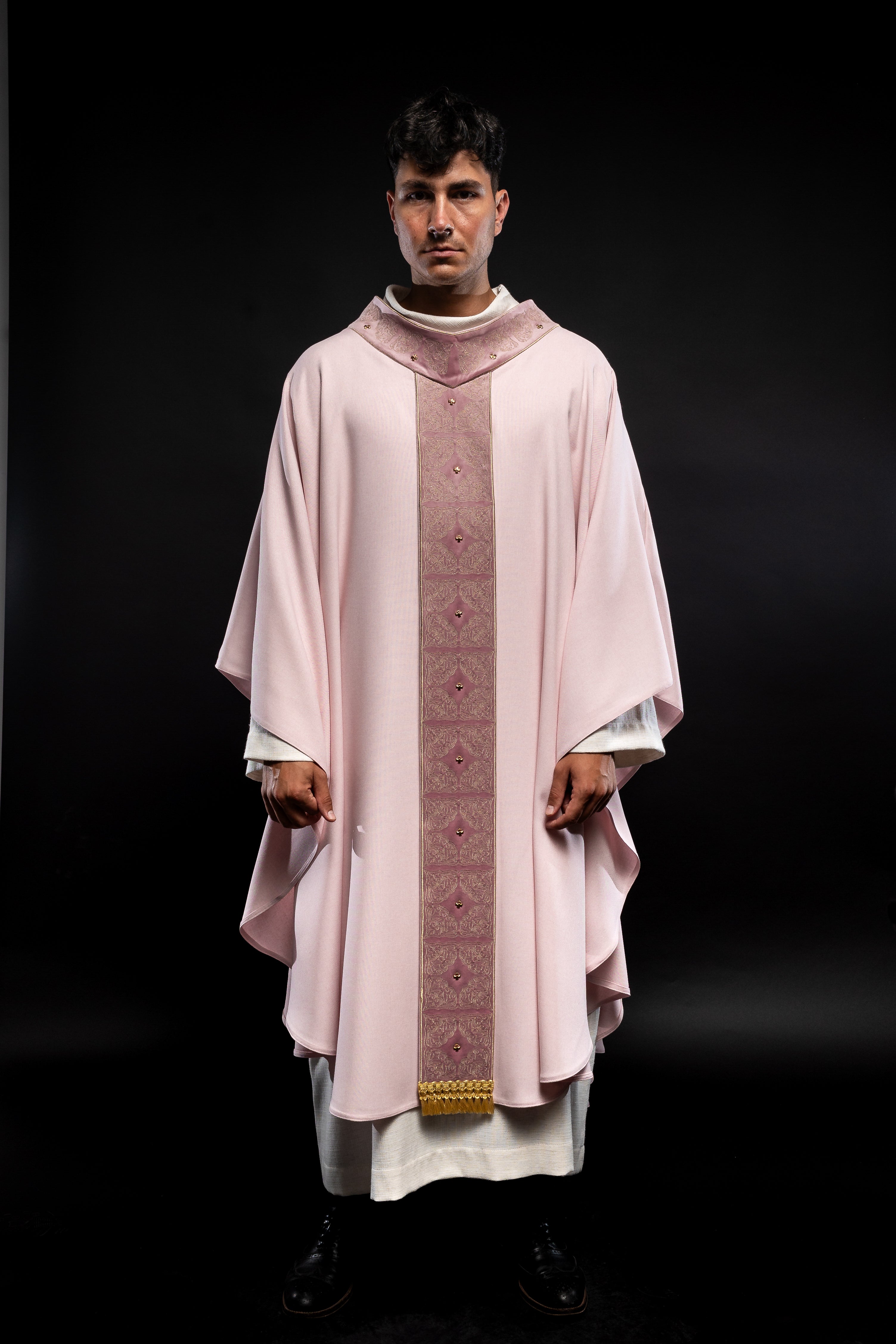 Pink priest robe made of natural touch texture and little decorative metal crosess