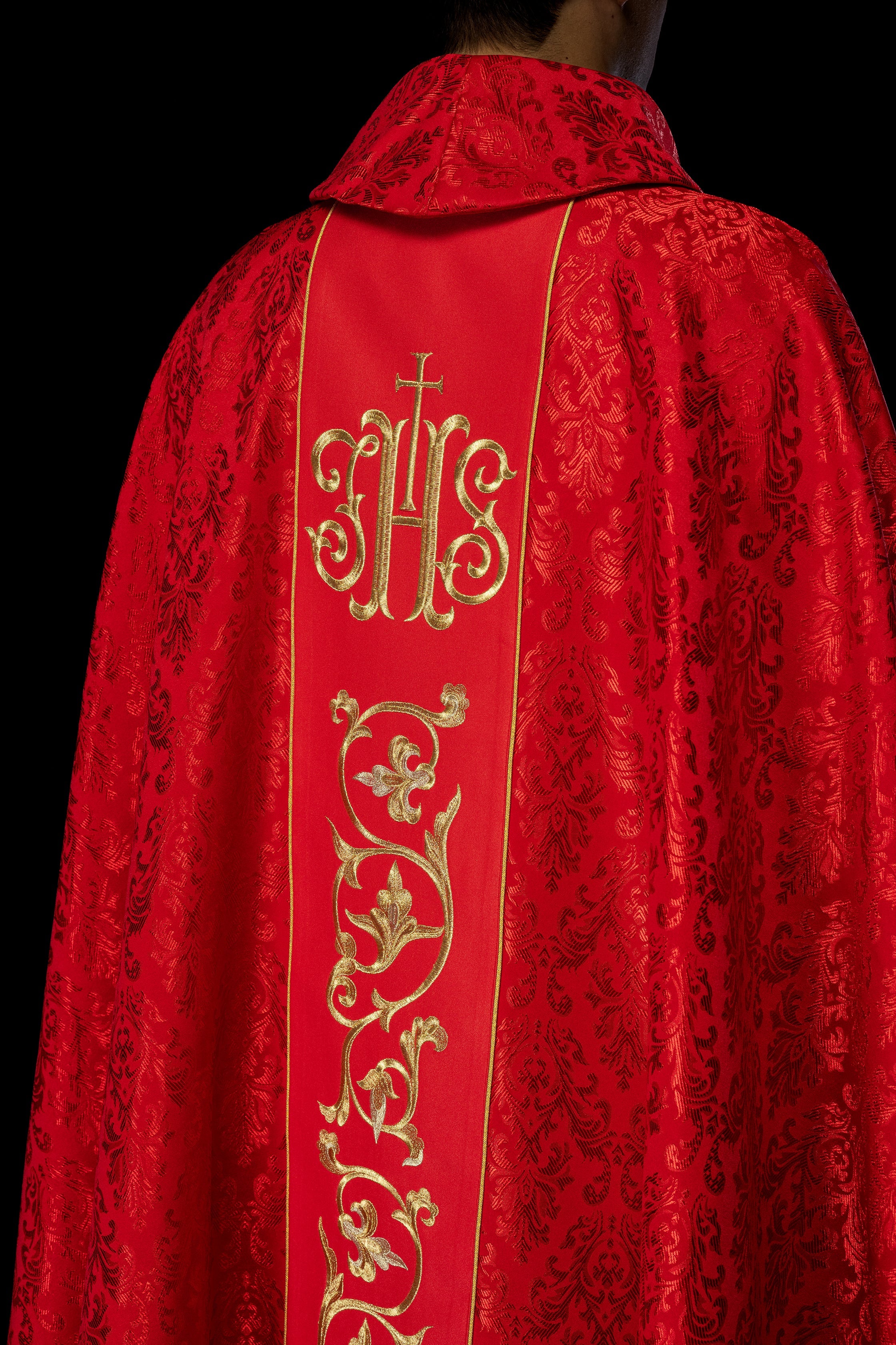 Red chasuble with JHS motif made of decorative texture