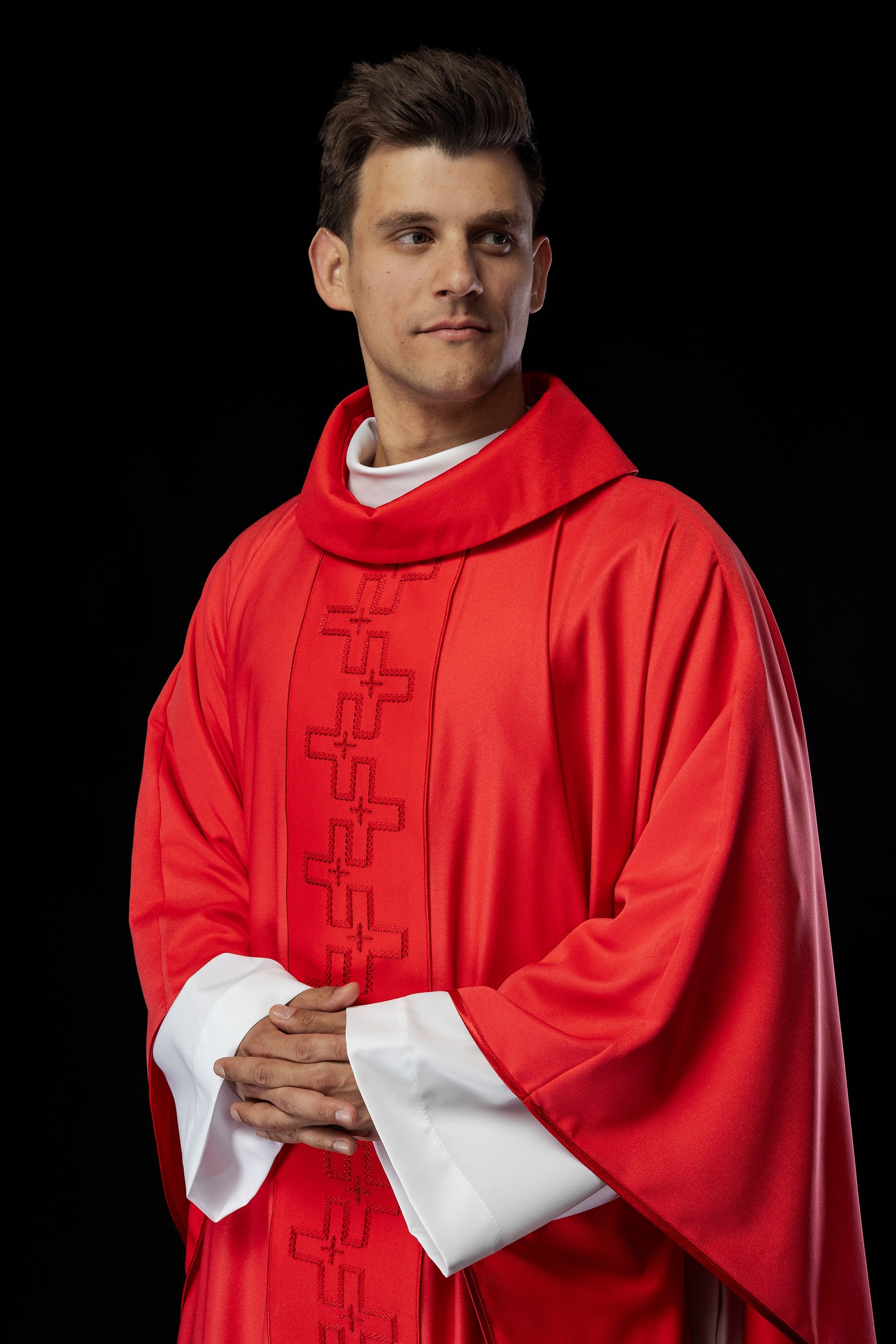 Catholic priest chasuble in red embroidery of crosses in red color