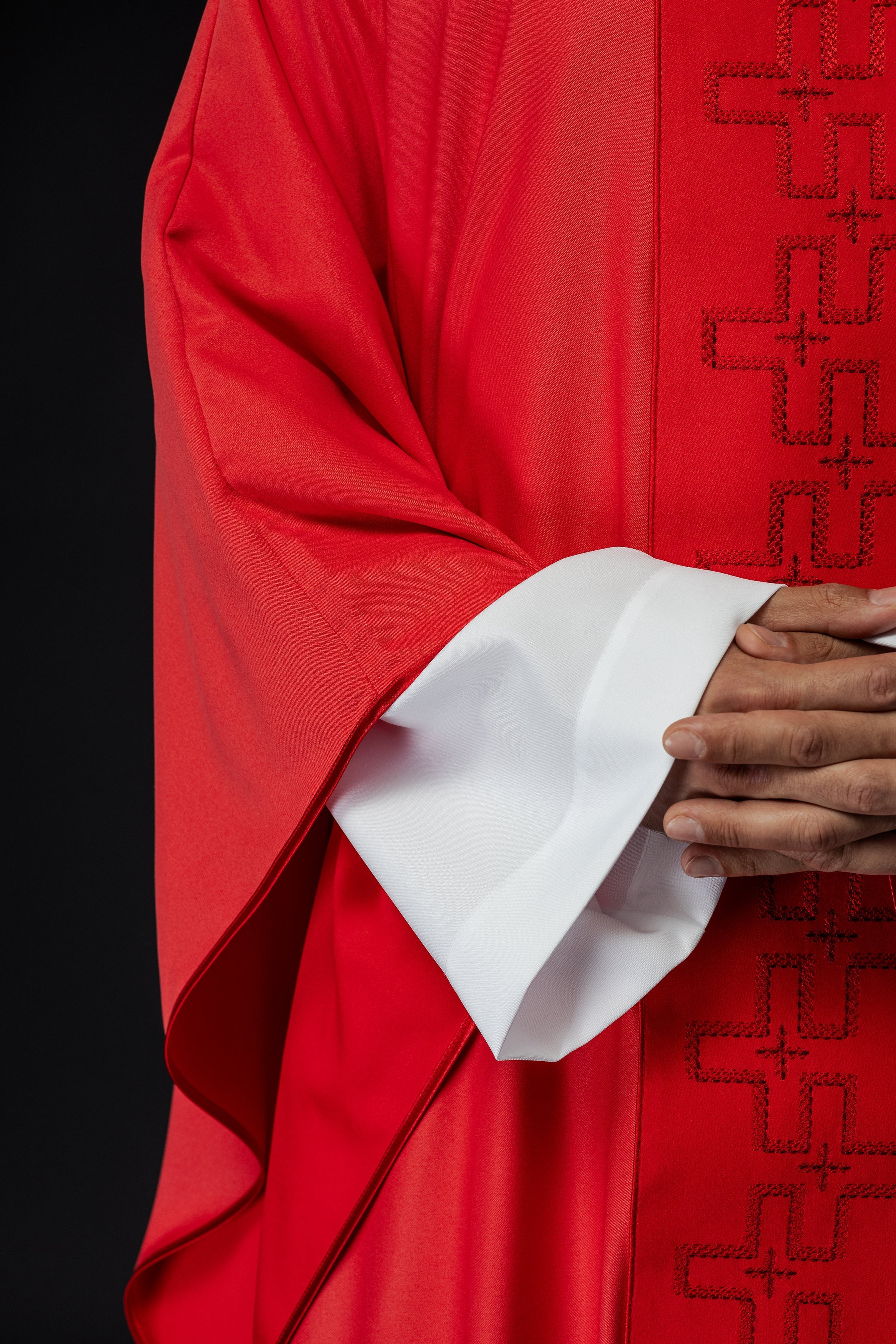 Catholic priest chasuble in red embroidery of crosses in red color