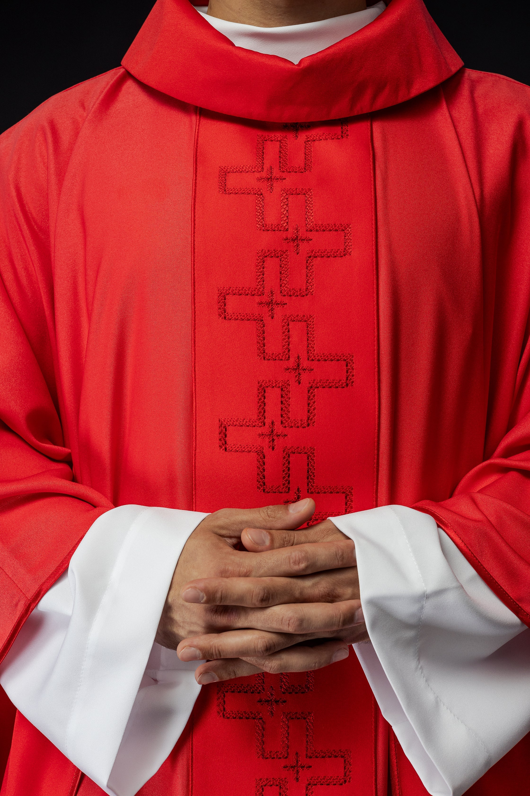 Catholic priest chasuble in red embroidery of crosses in red color