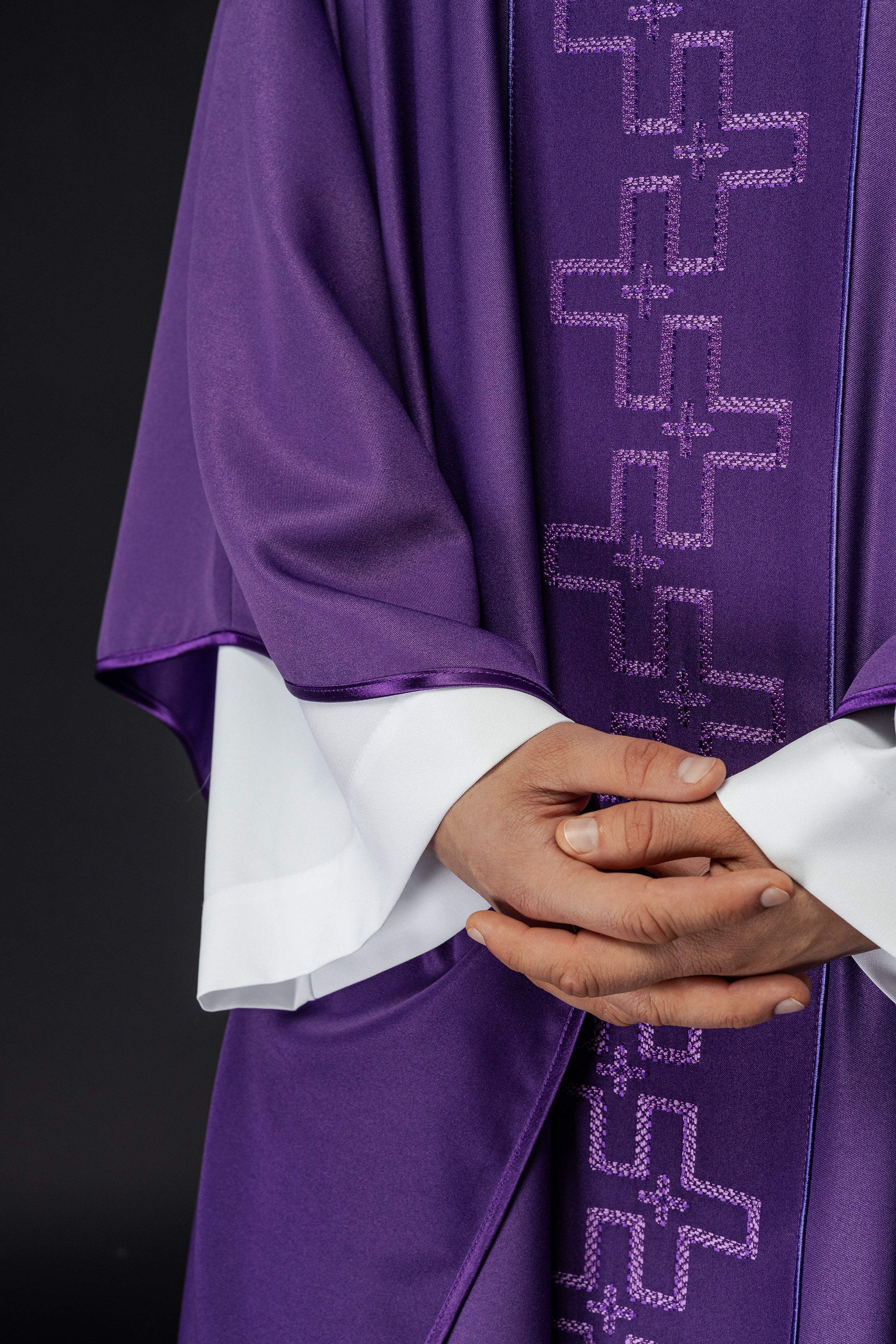 Chasuble with richly embroidered orphrey in embroidery of crosses in purple color