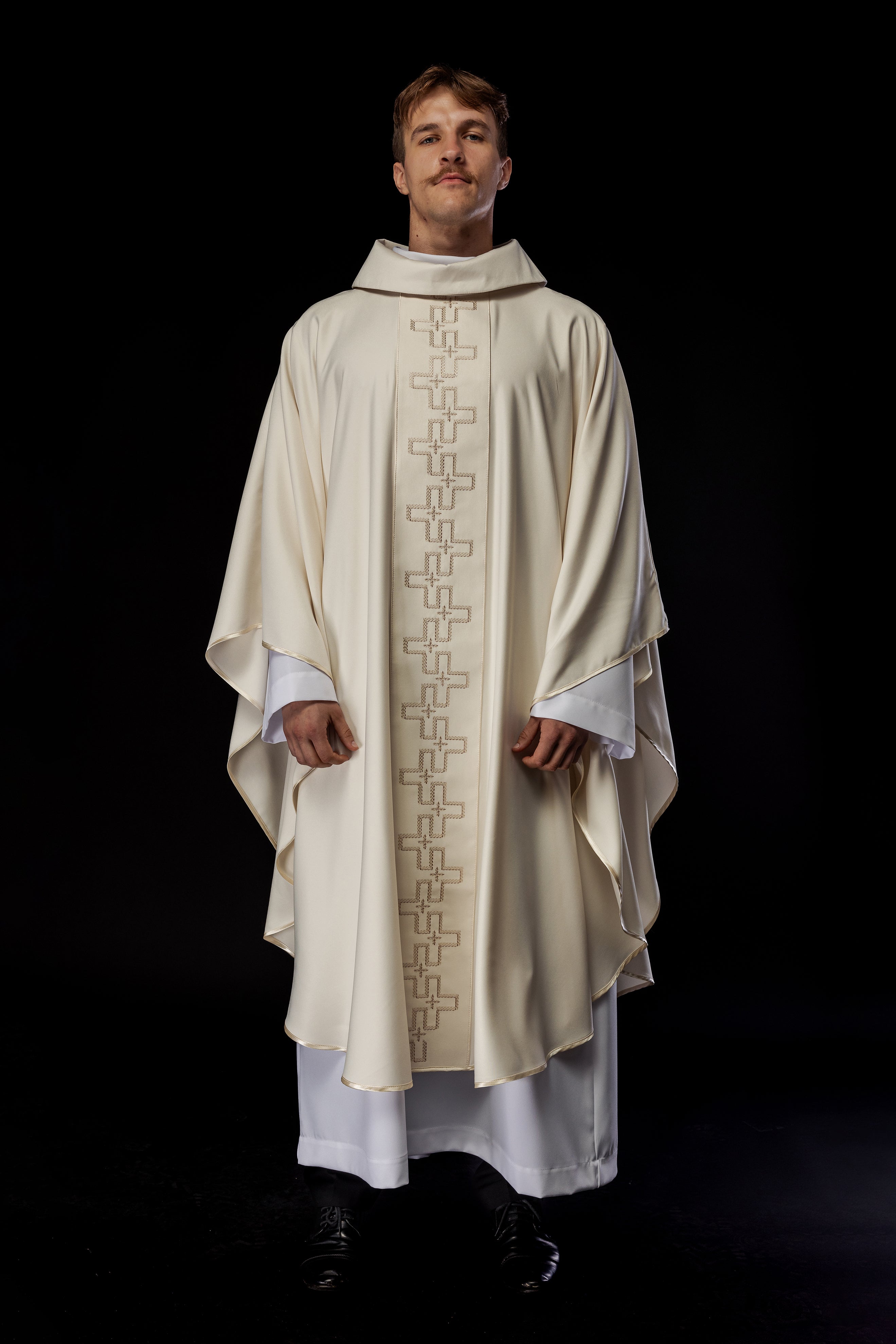 Chasuble with richly embroidered orphrey in embroidery of crosses in ecru color