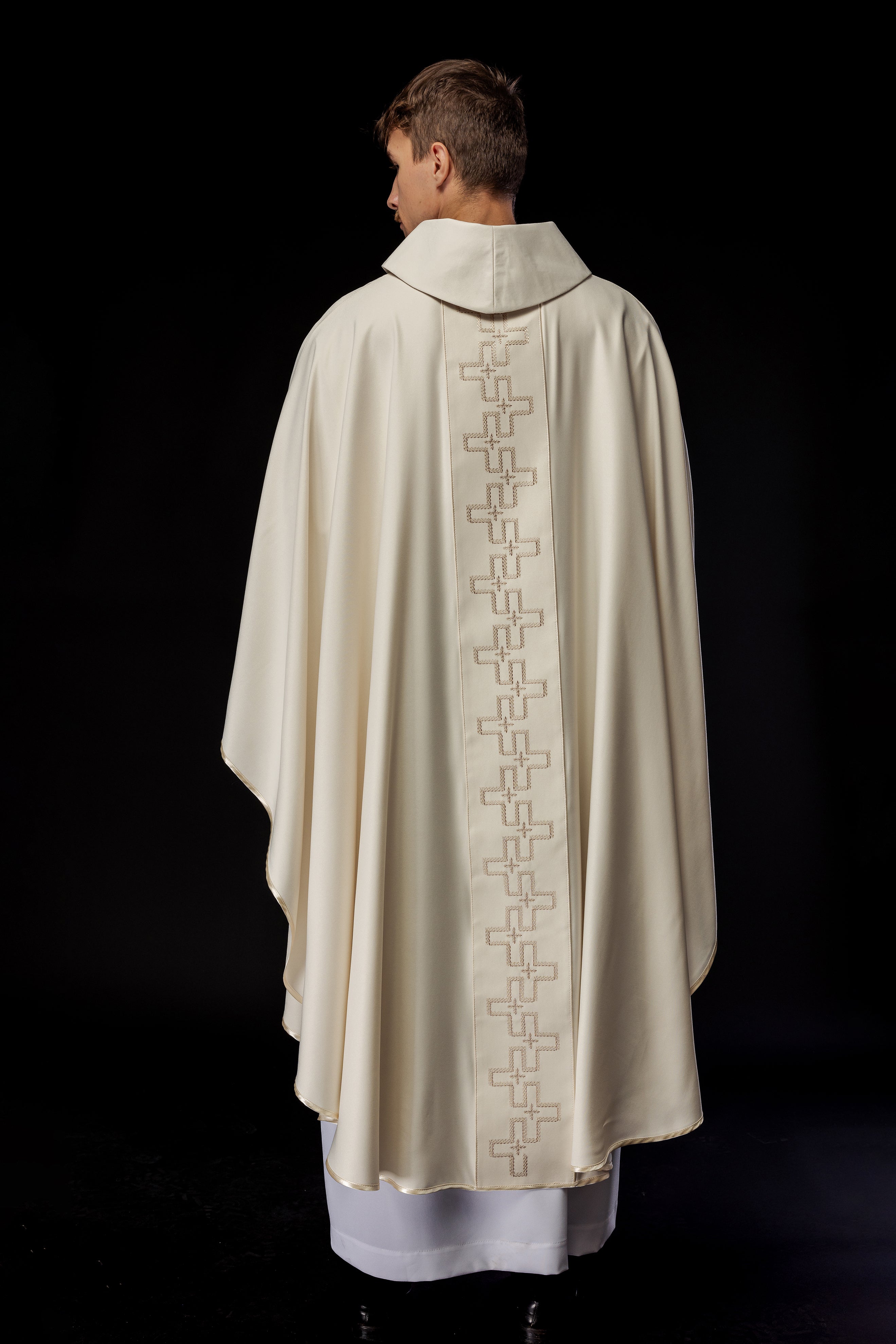 Chasuble with richly embroidered orphrey in embroidery of crosses in ecru color