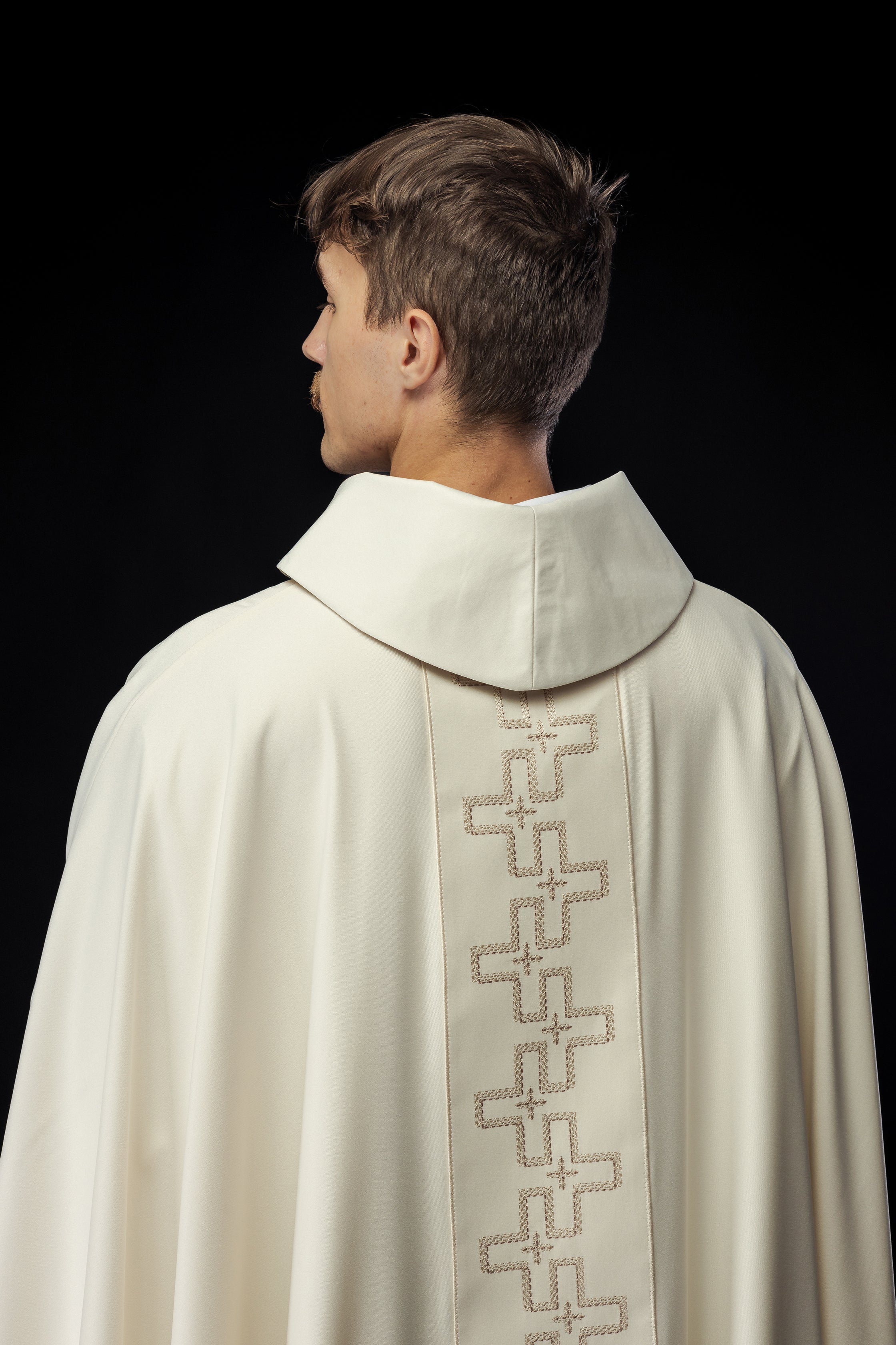 Chasuble with richly embroidered orphrey in embroidery of crosses in ecru color