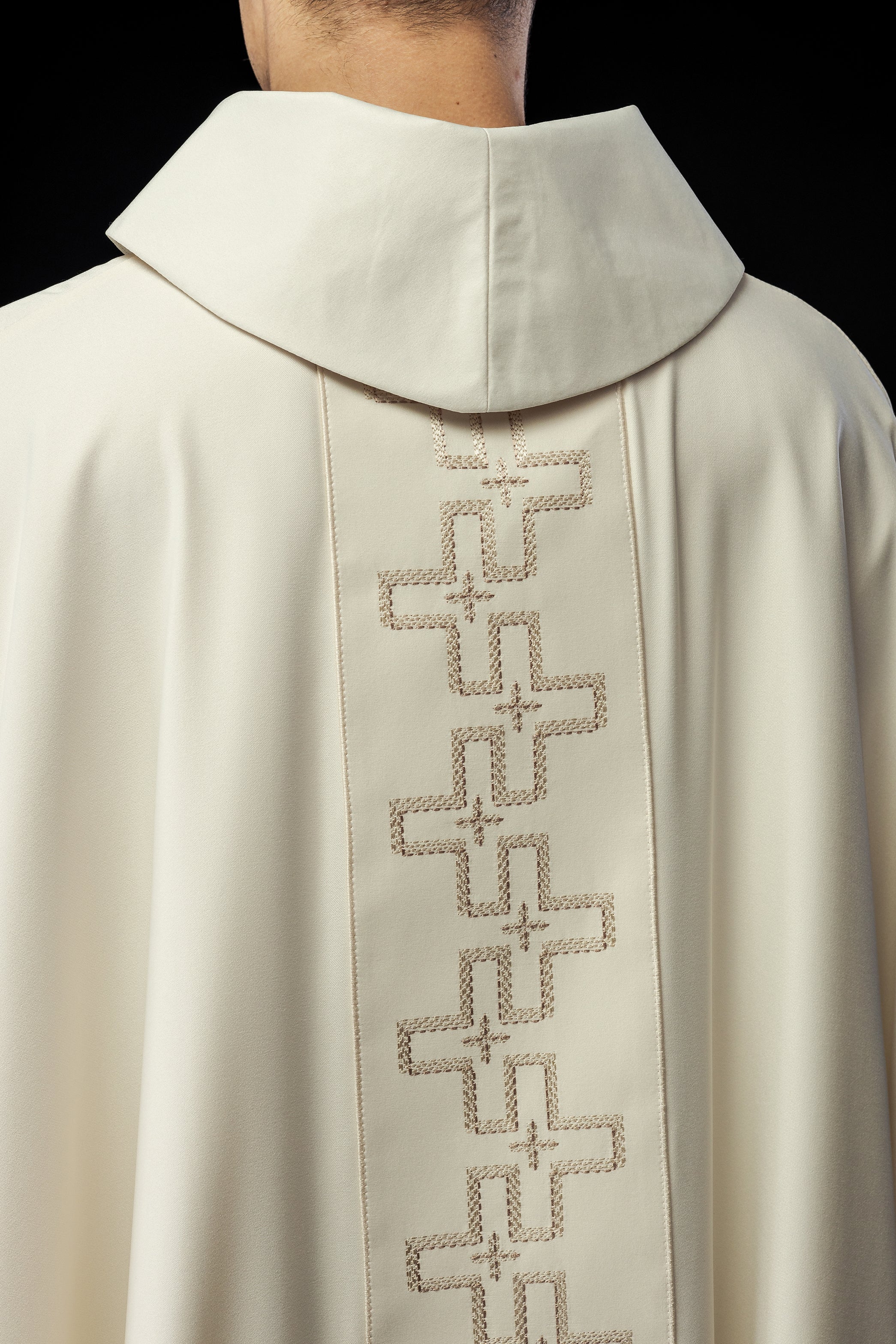 Chasuble with richly embroidered orphrey in embroidery of crosses in ecru color