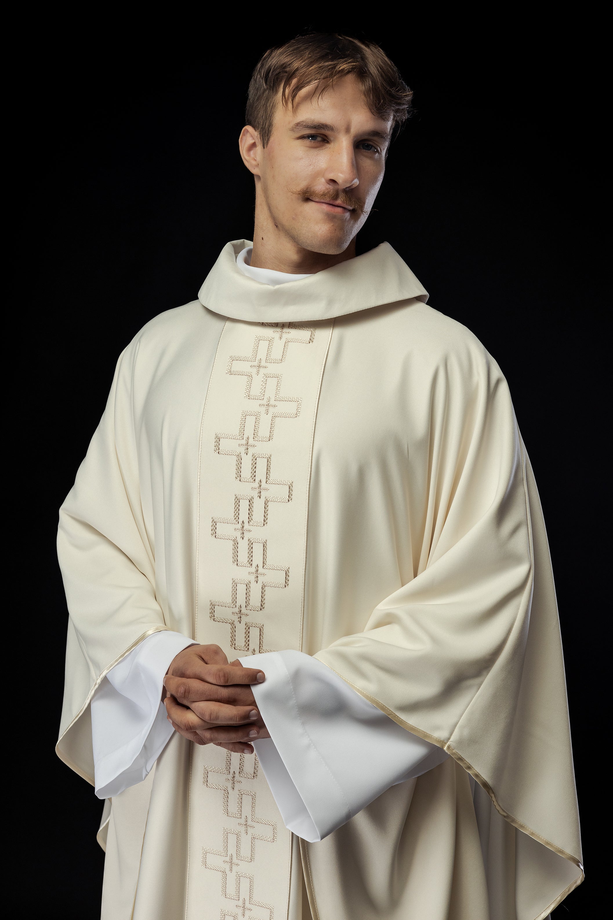 Chasuble with richly embroidered orphrey in embroidery of crosses in ecru color