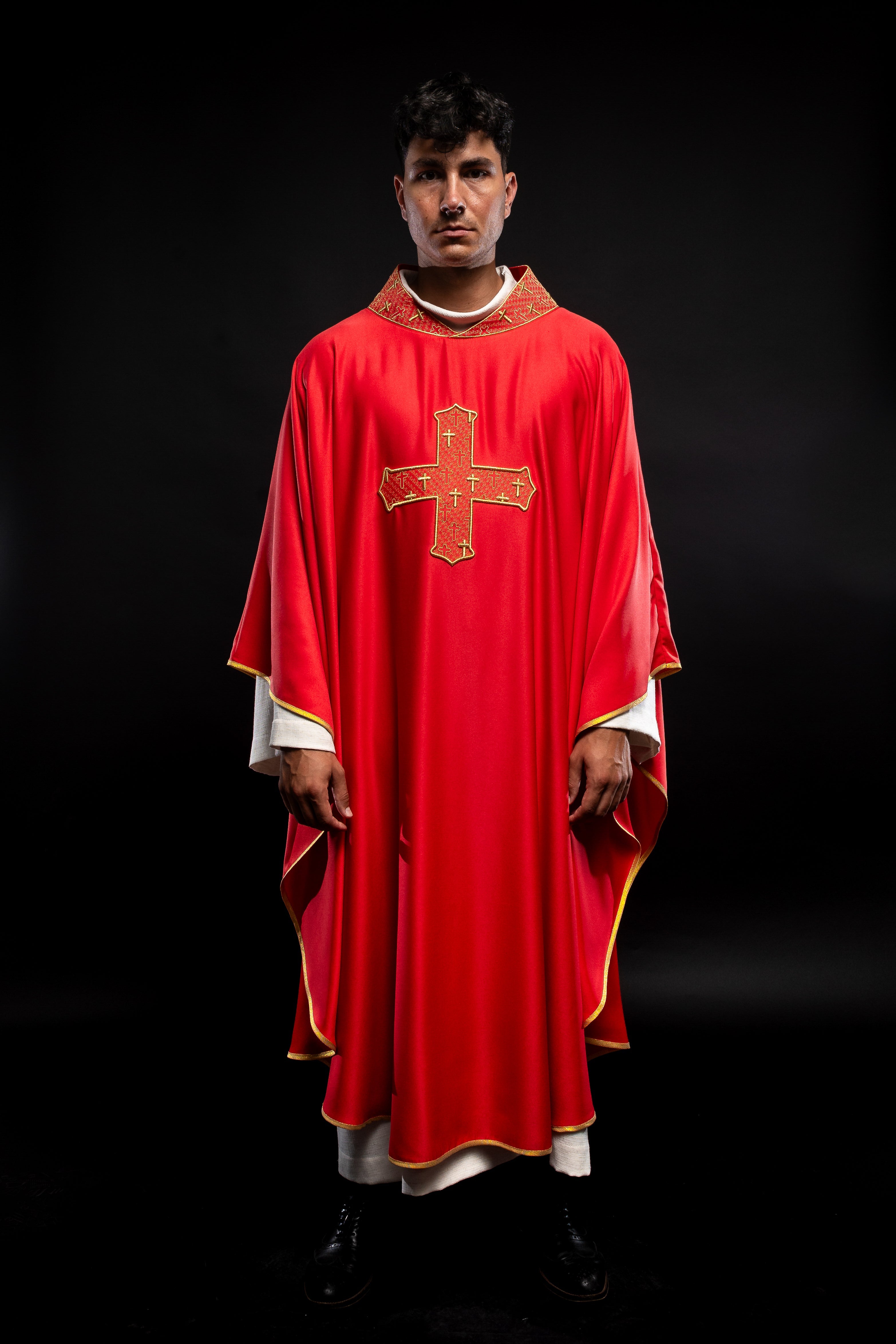 Red priest vestment with collar embroidered with gold crossess