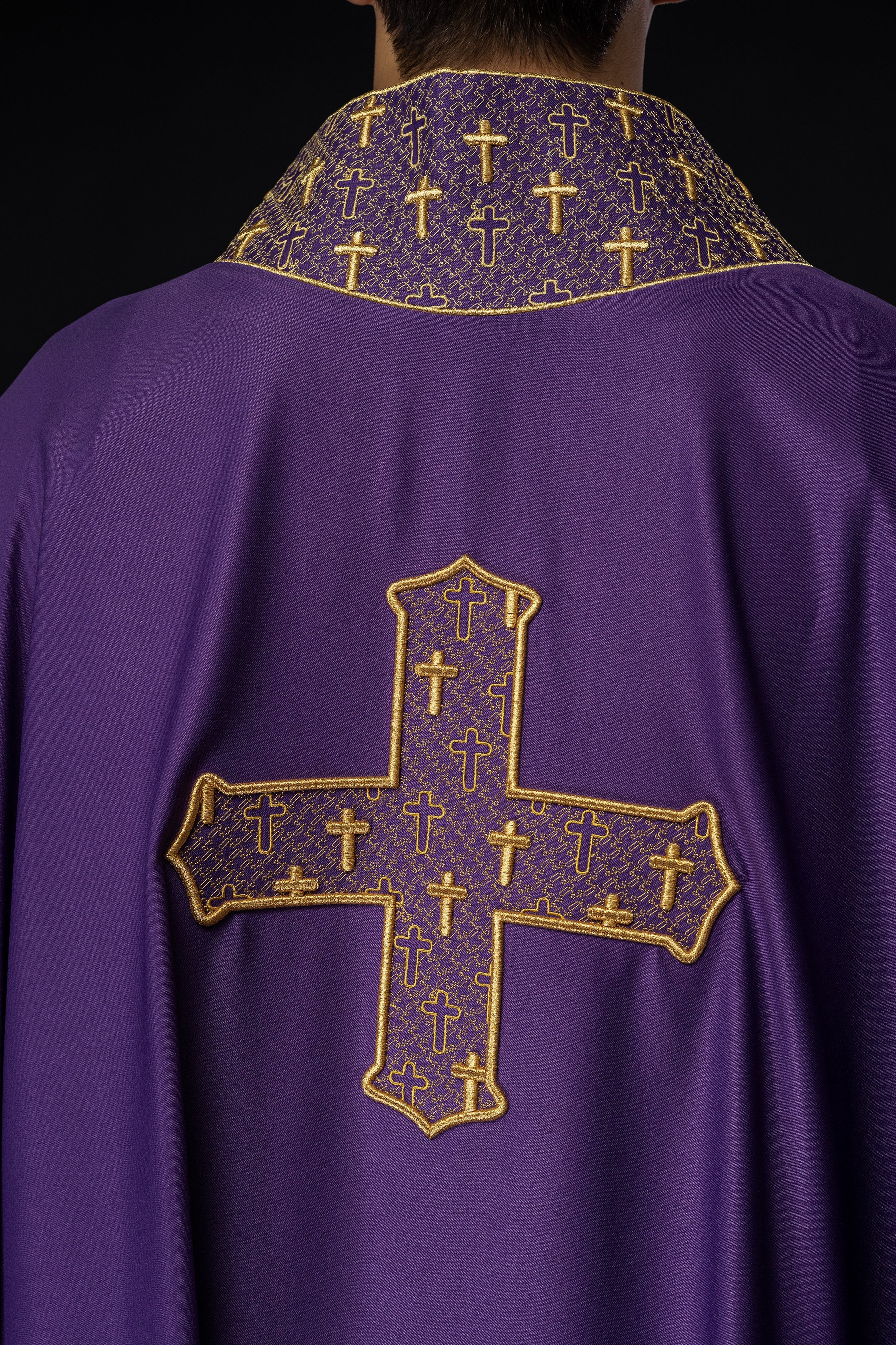 Purple chasuble with gold collar and cross embroidery