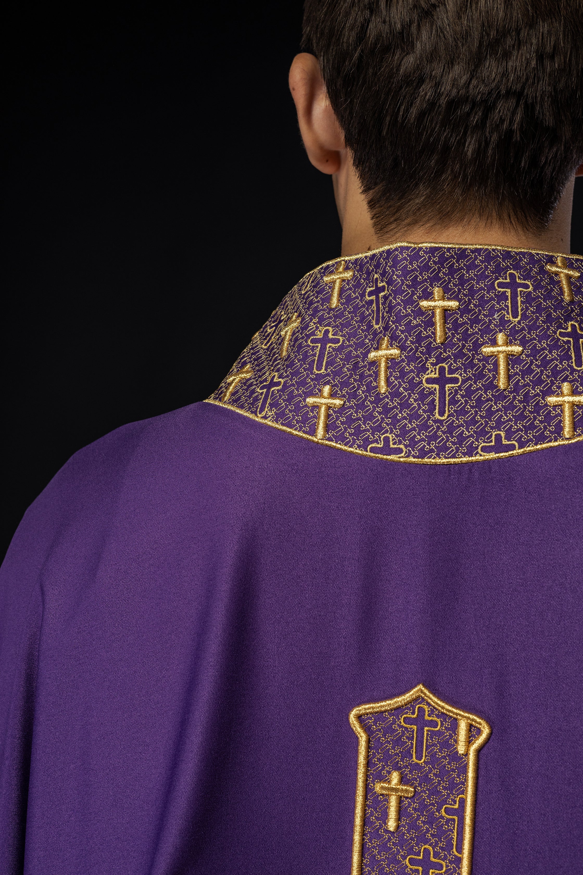 Purple chasuble with gold collar and cross embroidery