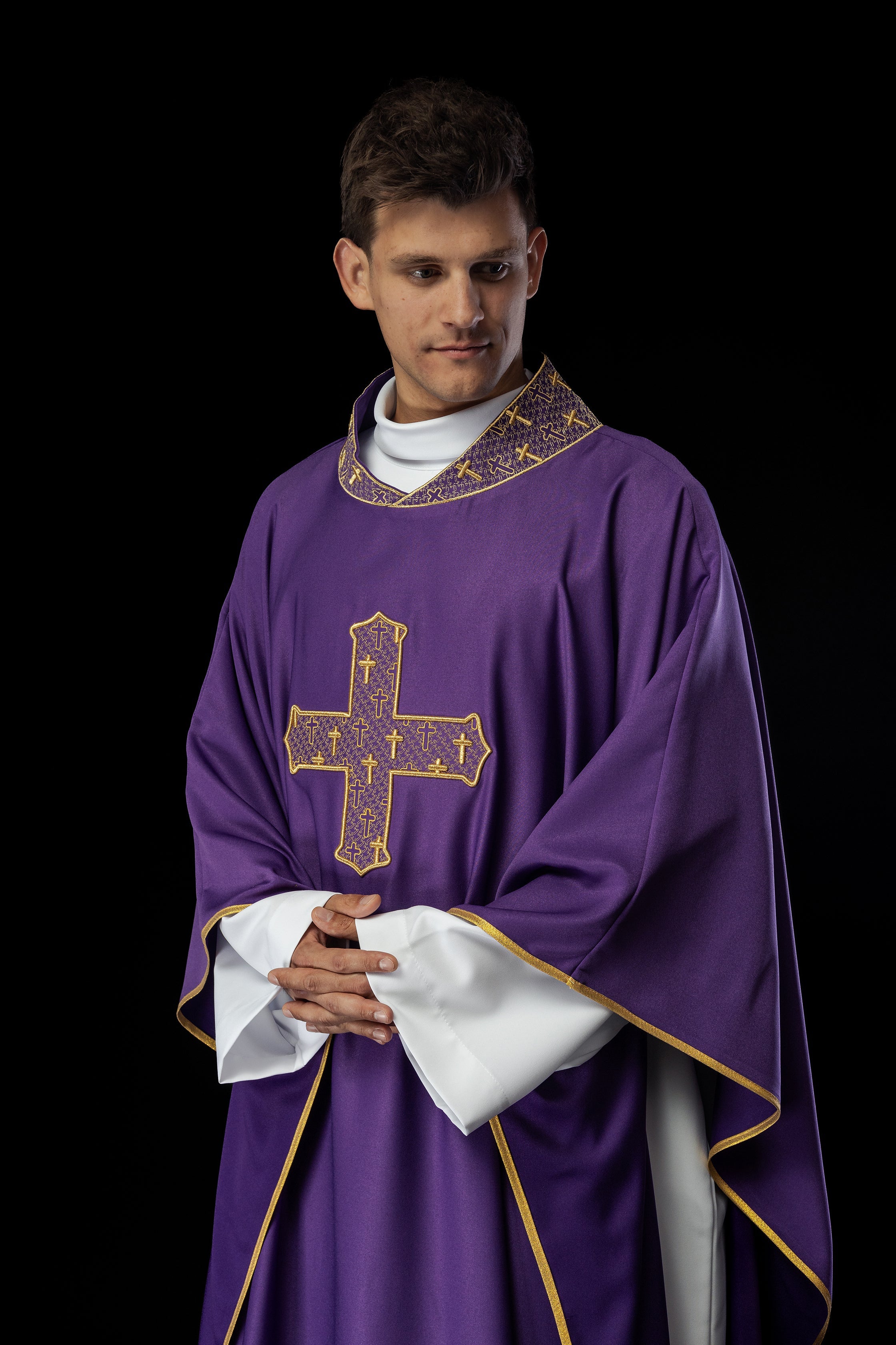 Purple chasuble with gold collar and cross embroidery