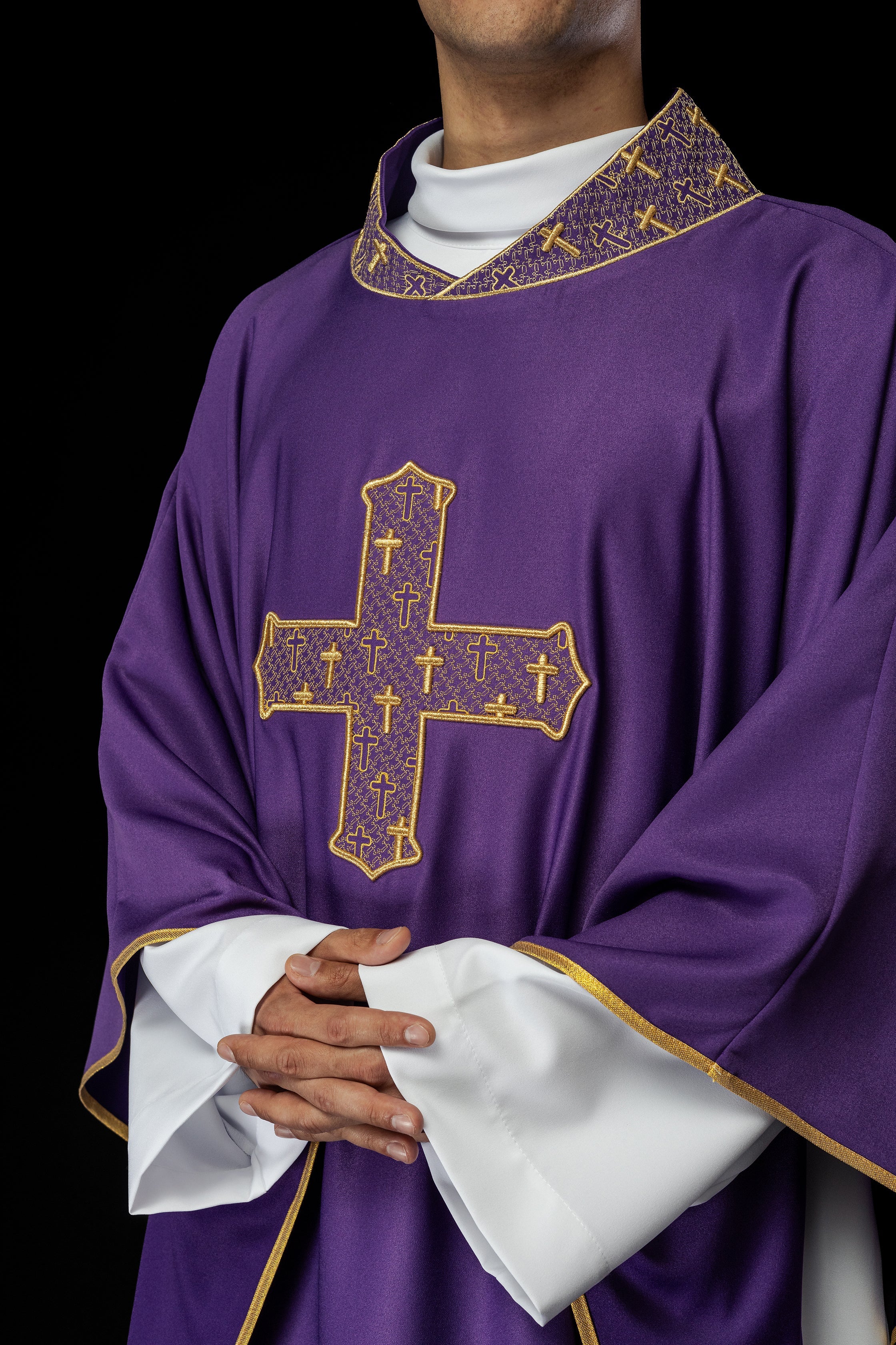 Purple chasuble with gold collar and cross embroidery