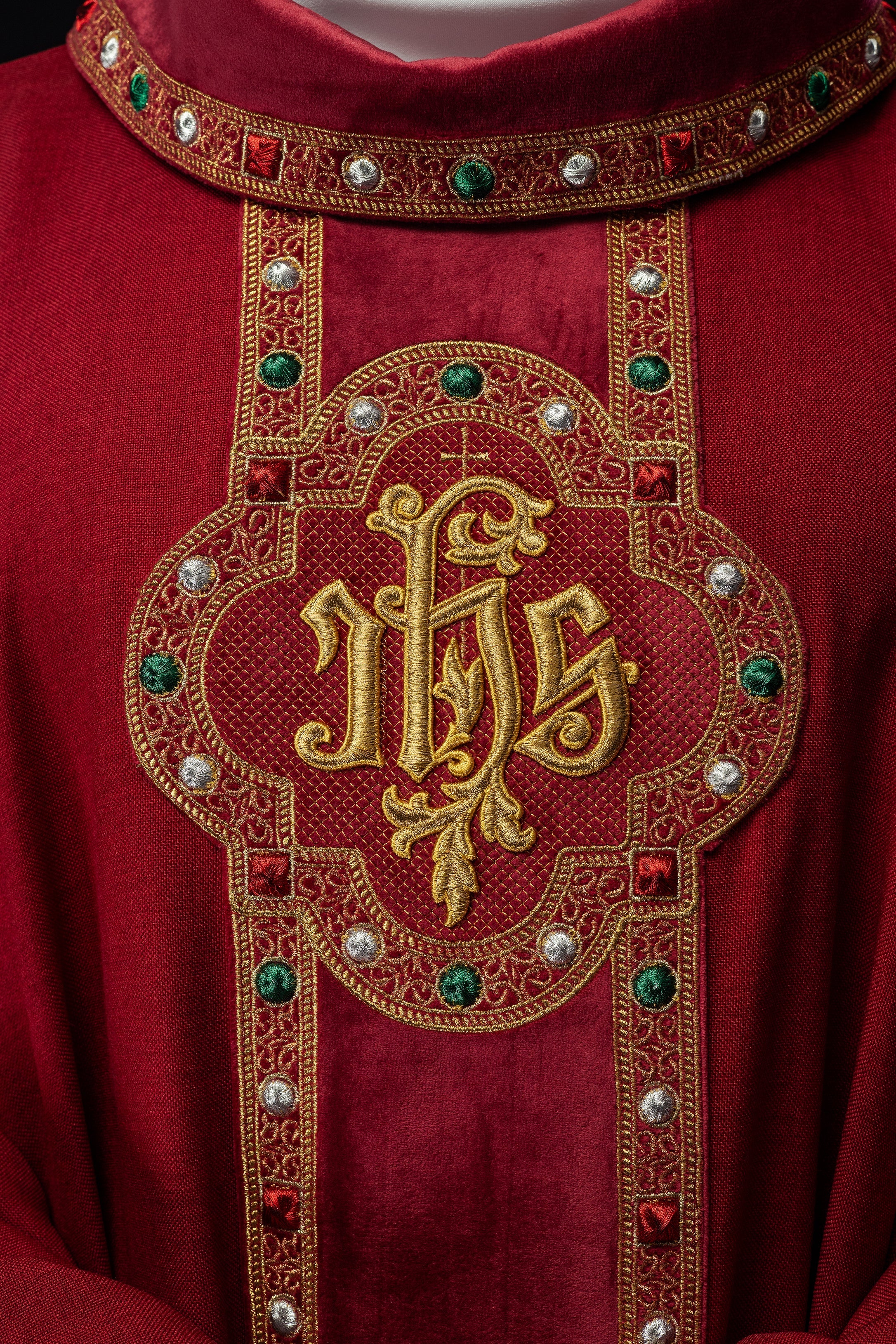 Chasuble with richly embroidered belt and piping around IHS collar embroidery in red