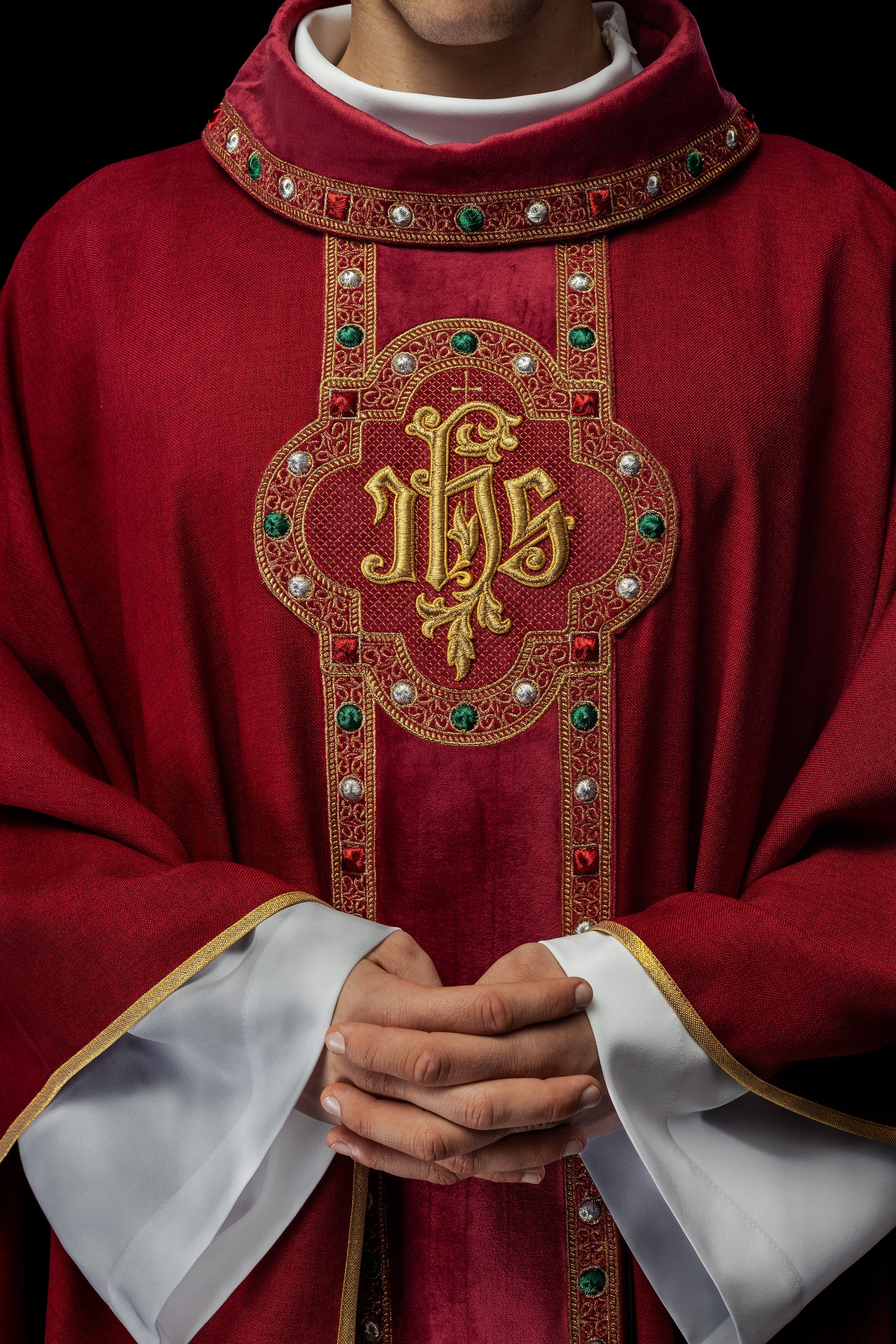 Chasuble with richly embroidered belt and piping around IHS collar embroidery in red