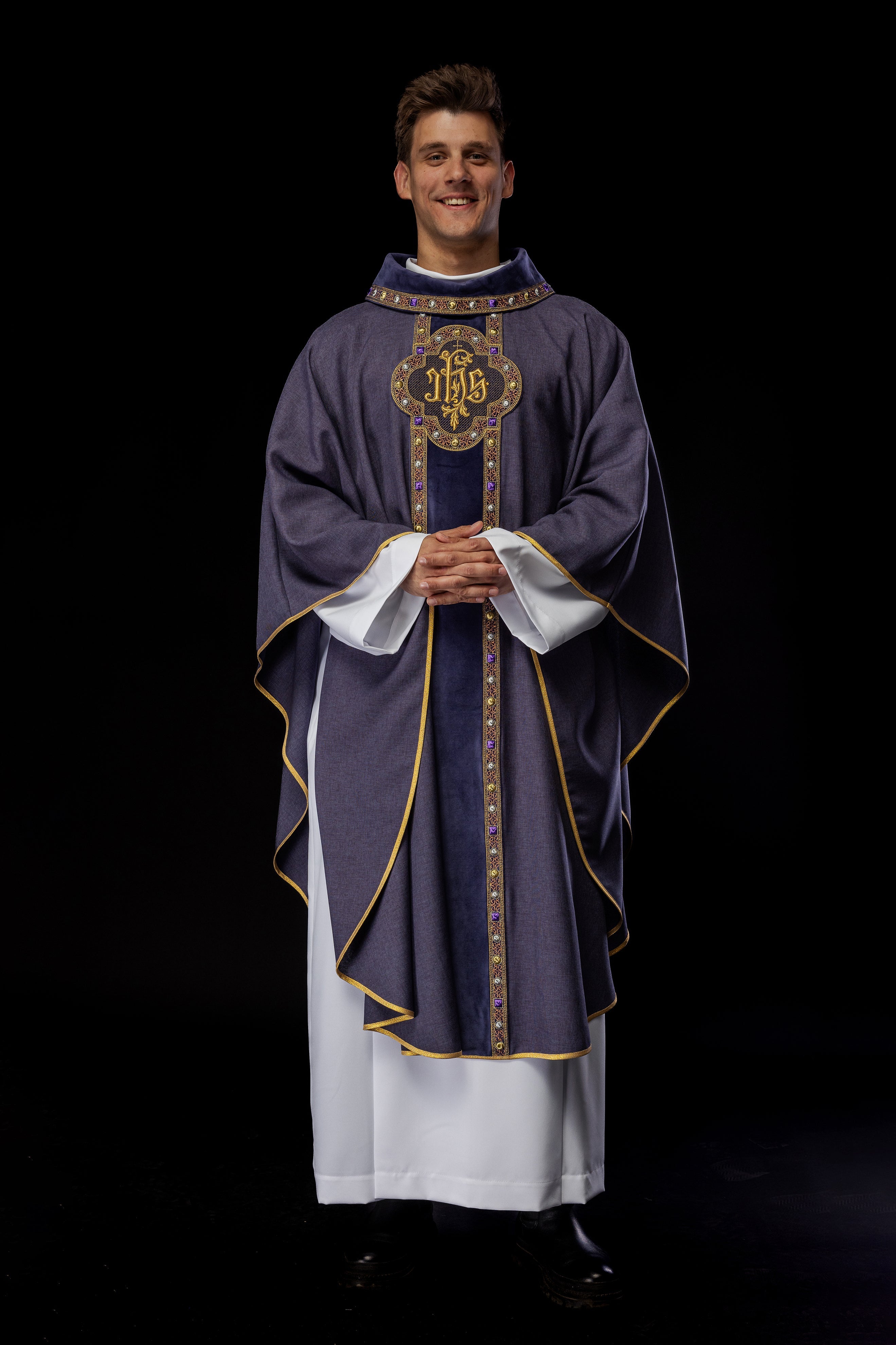 Chasuble with richly embroidered orphrey and piping around the IHS I collar embroidery in purple