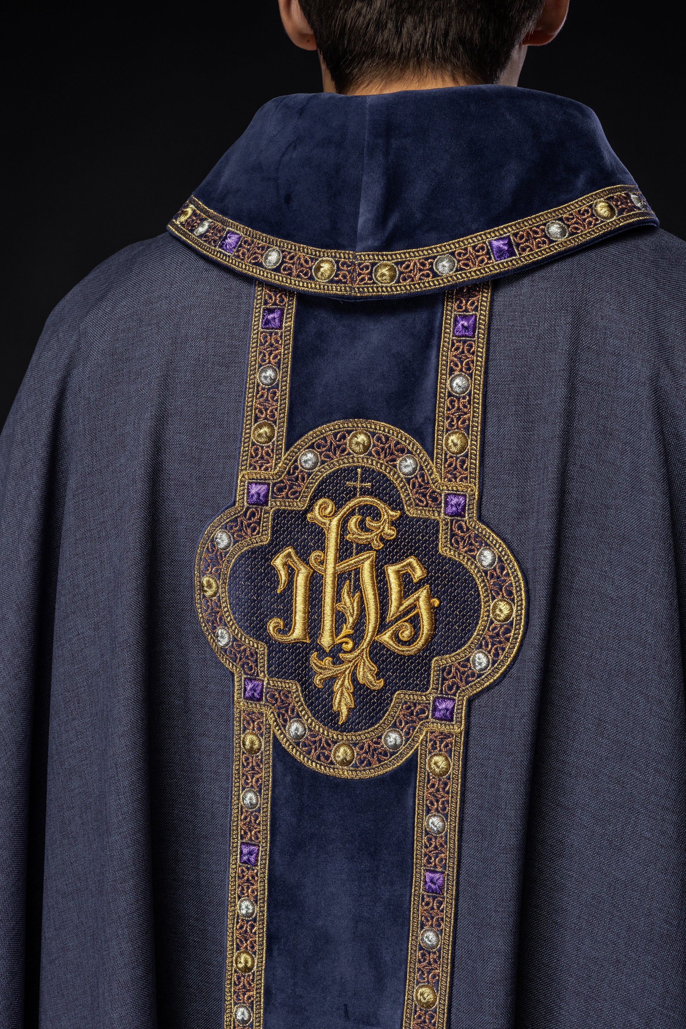 Chasuble with richly embroidered orphrey and piping around the IHS I collar embroidery in purple