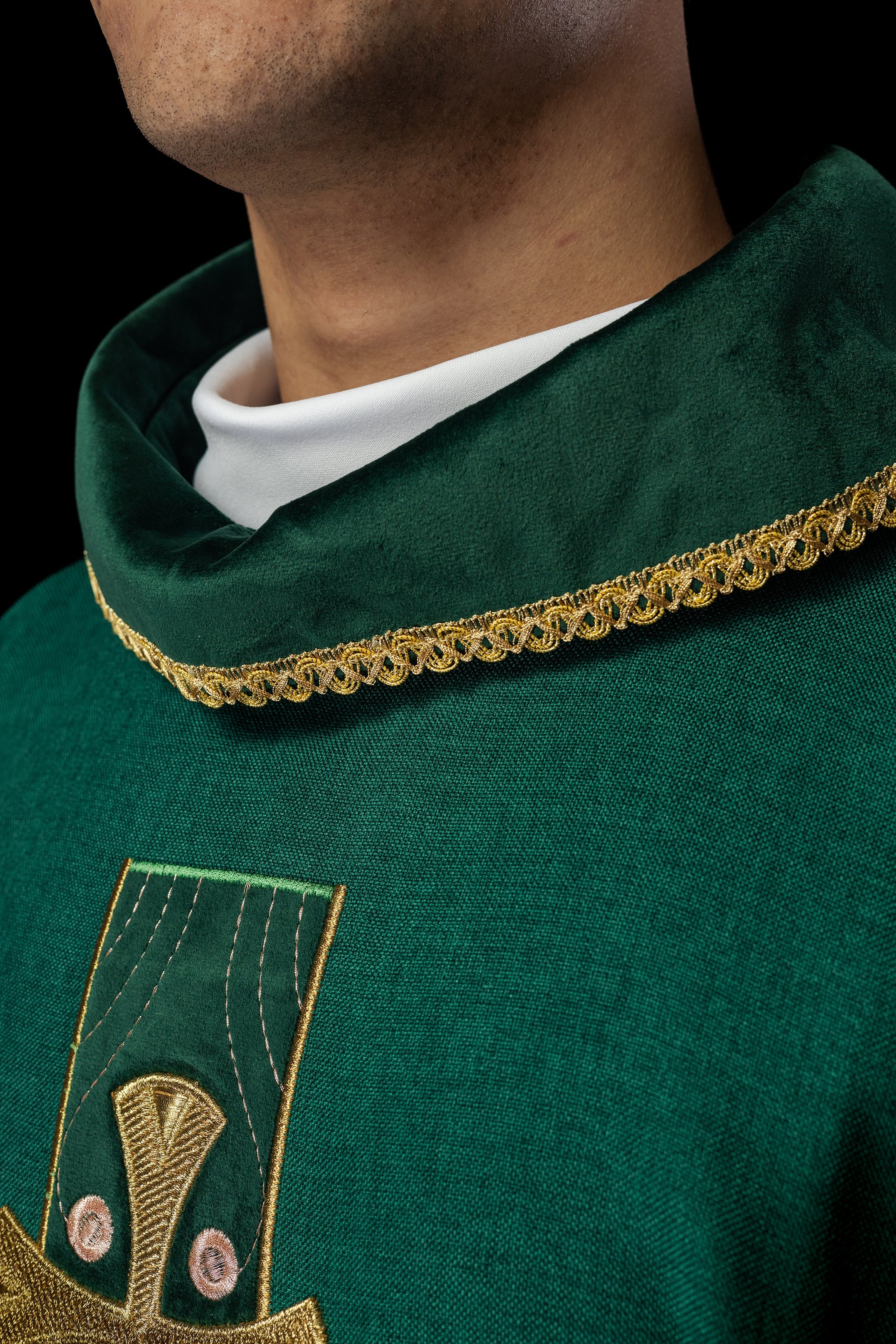 Chasuble with embroidered gold crosses and piping on the collar in green