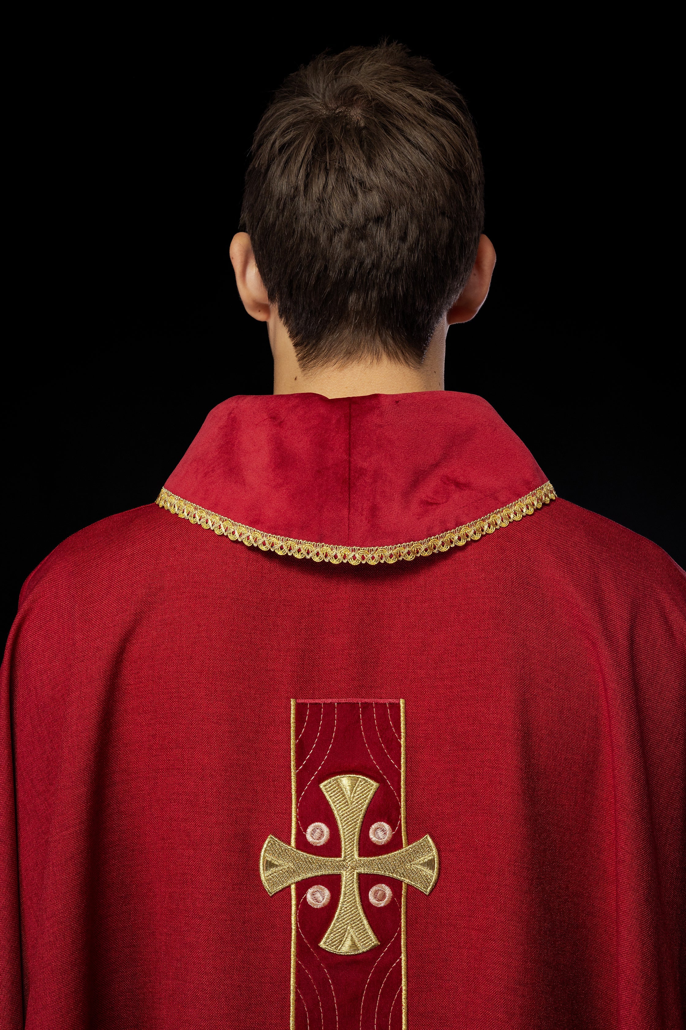 Chasuble with embroidered gold crosses and piping on the collar in red