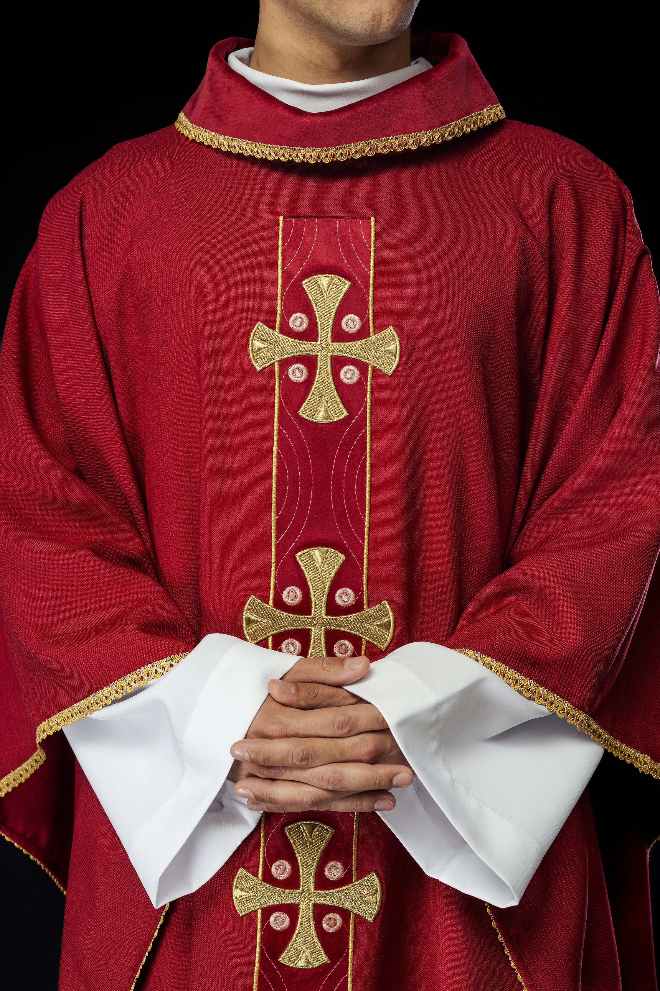 Chasuble with embroidered gold crosses and piping on the collar in red