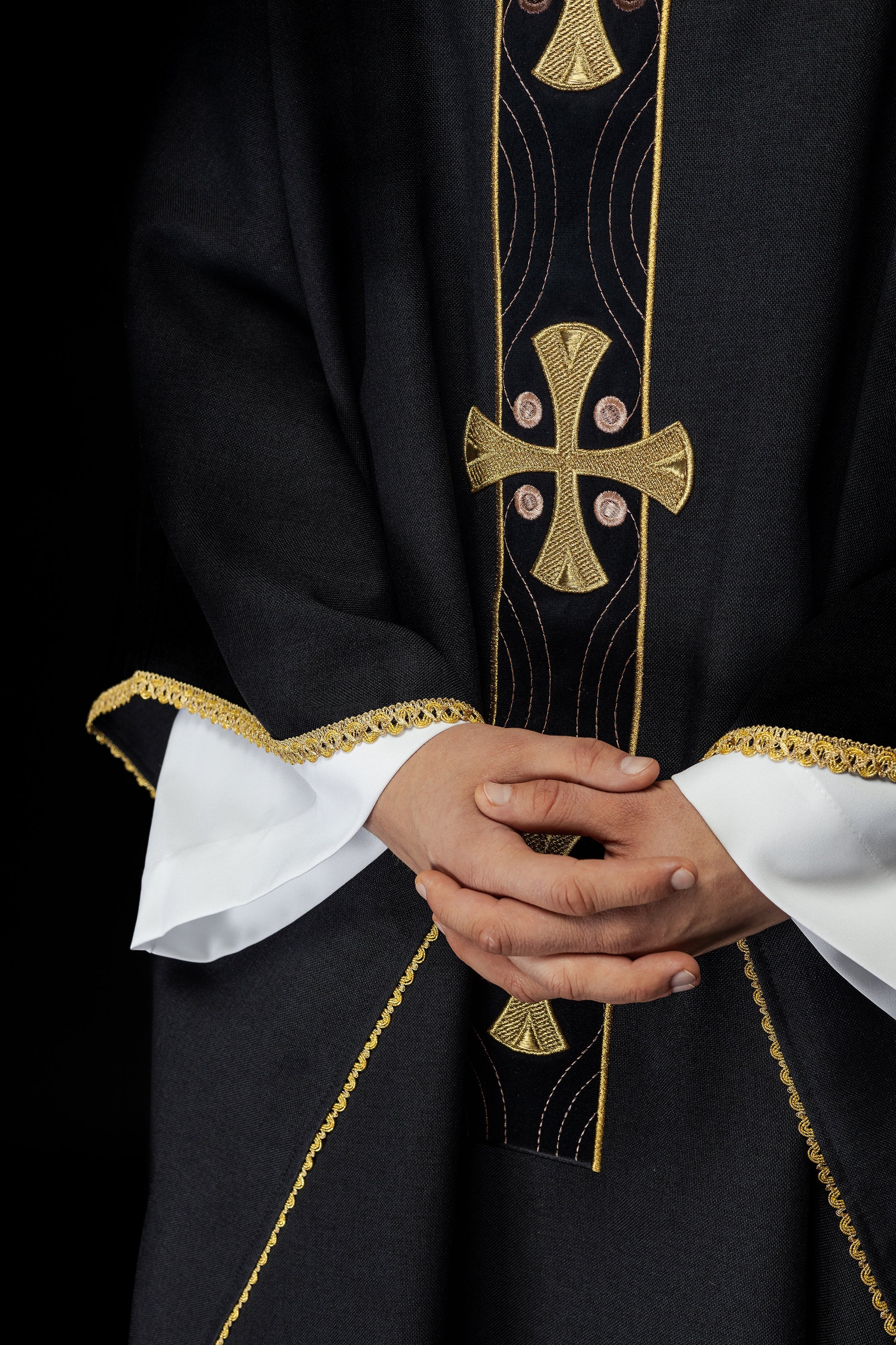 Chasuble with embroidered gold crosses and piping on the collar in black