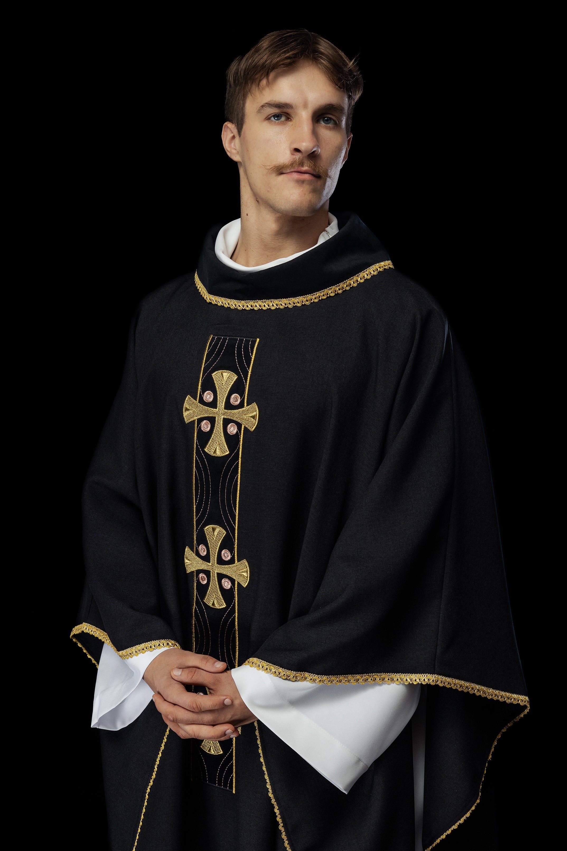 Chasuble with embroidered gold crosses and piping on the collar in black