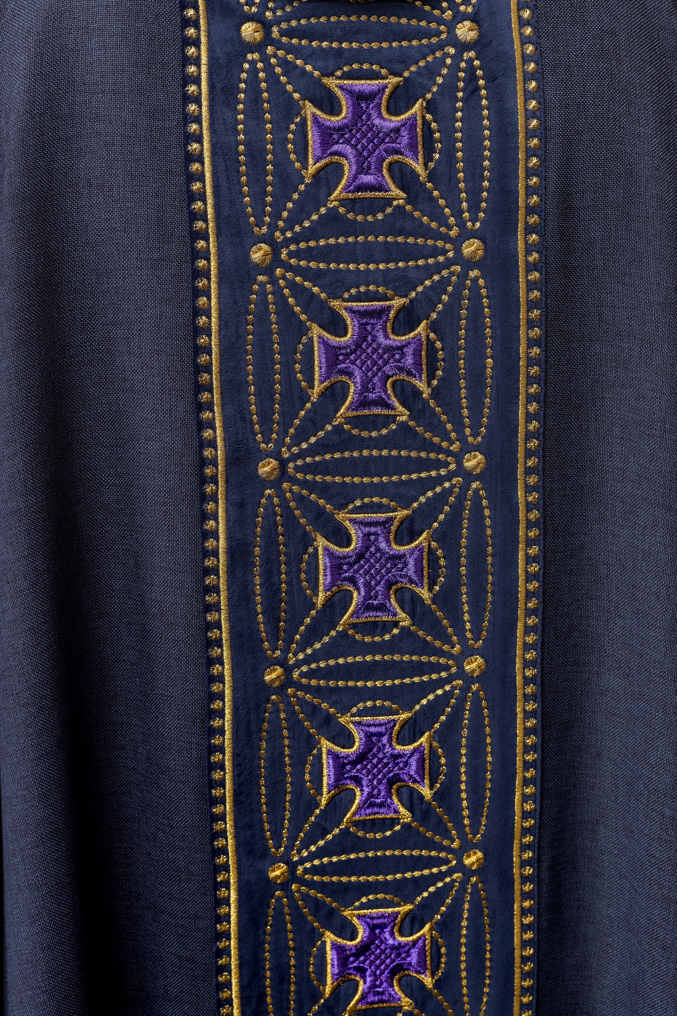 Purple priest chasuble made of natural texture with embroidered collar