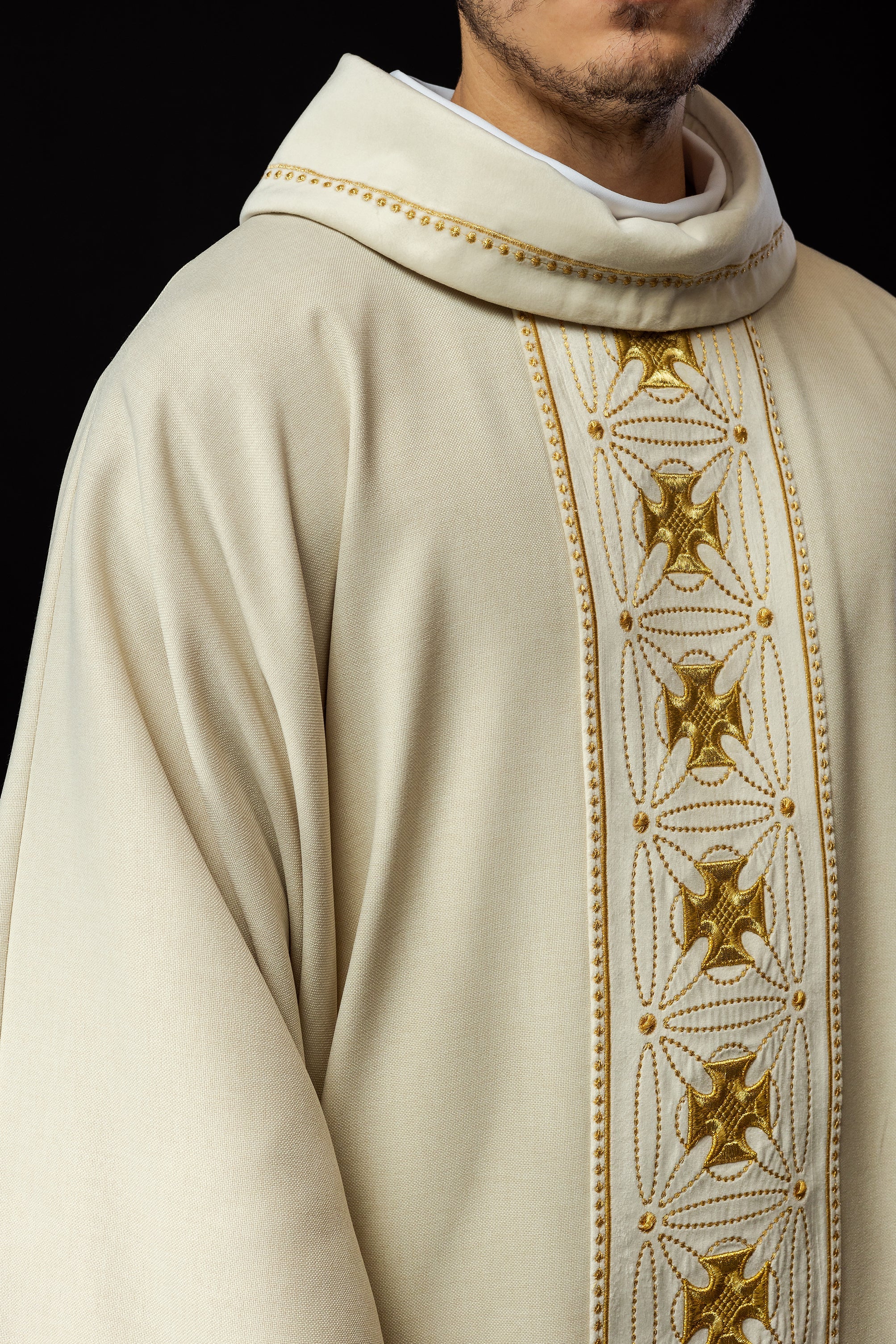 Ivory priest chasuble made of natural texture with embroidered collar