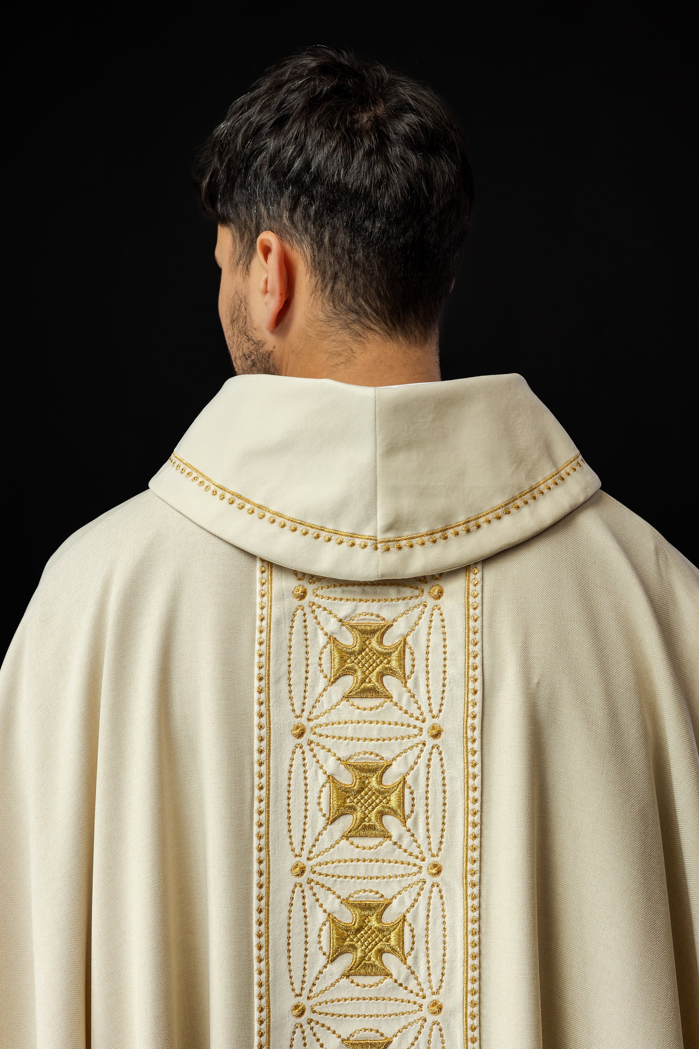 Ivory priest chasuble made of natural texture with embroidered collar