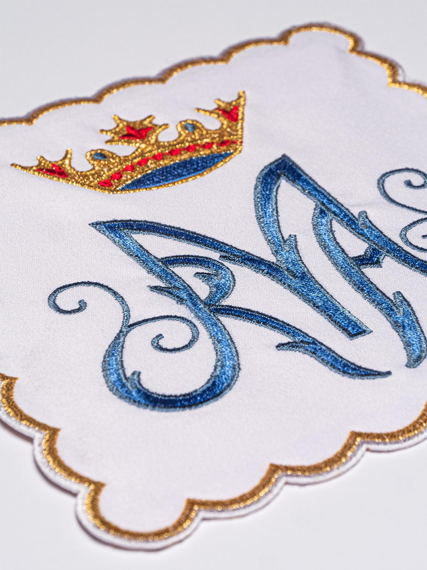 Chalice Linens with blue and gold Marian symbol