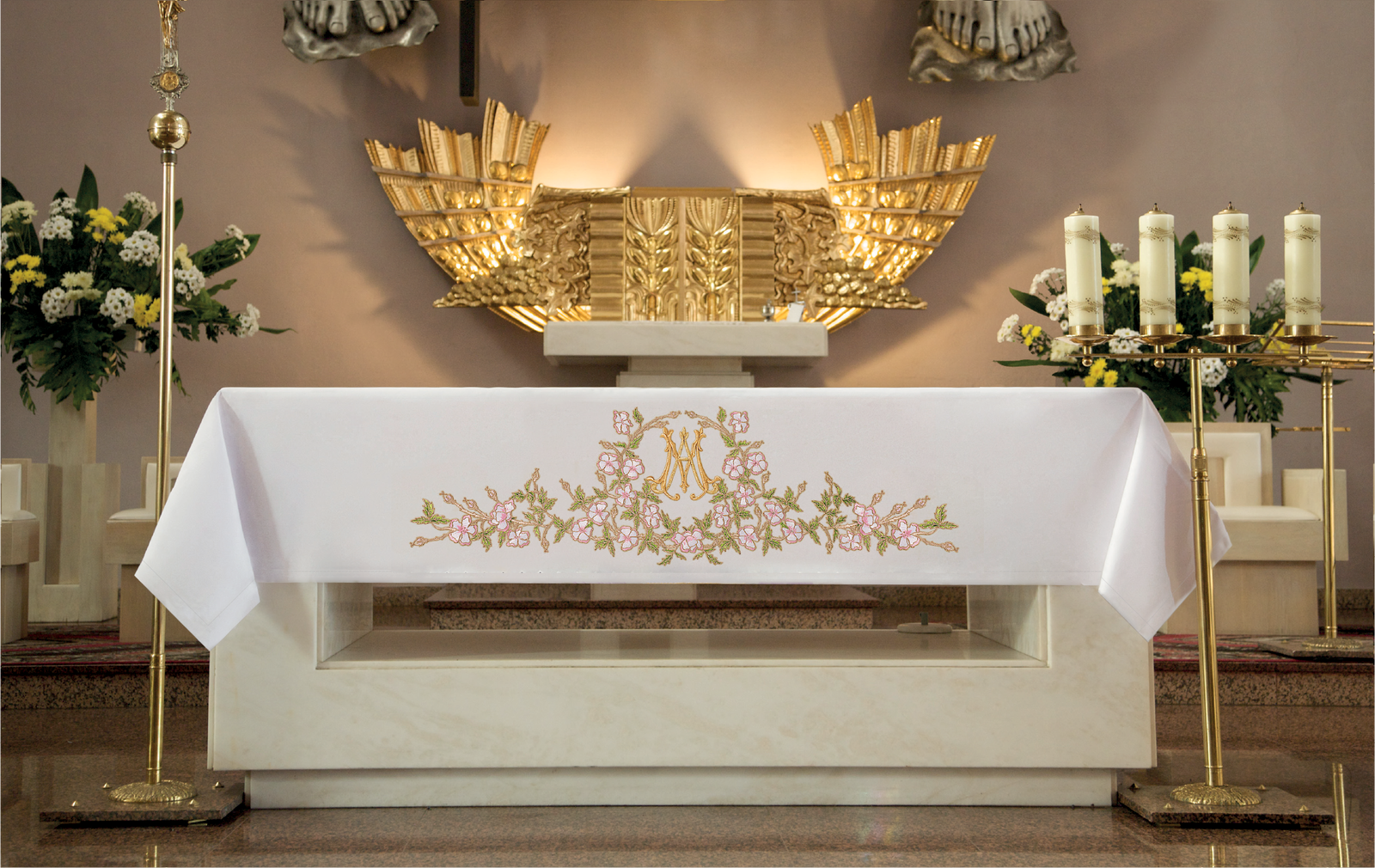 Richly decorated altar tablecloth with frontal embroidery and Marian motifs