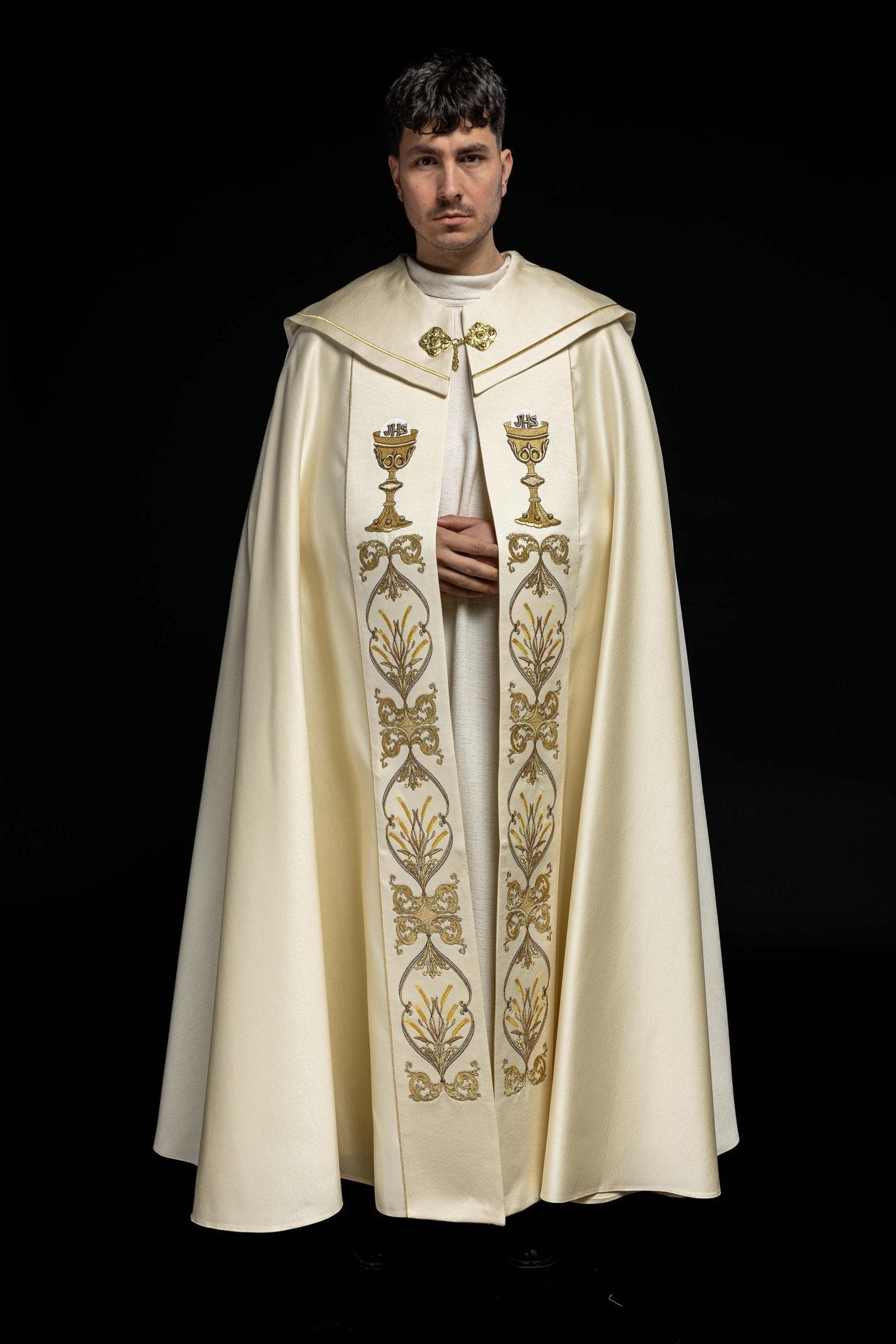 Clerical cope with embroidered gold IHS motif KKP/006/05 ECRU SAT.POMPON 145cm - HAFTINAUSA.COM