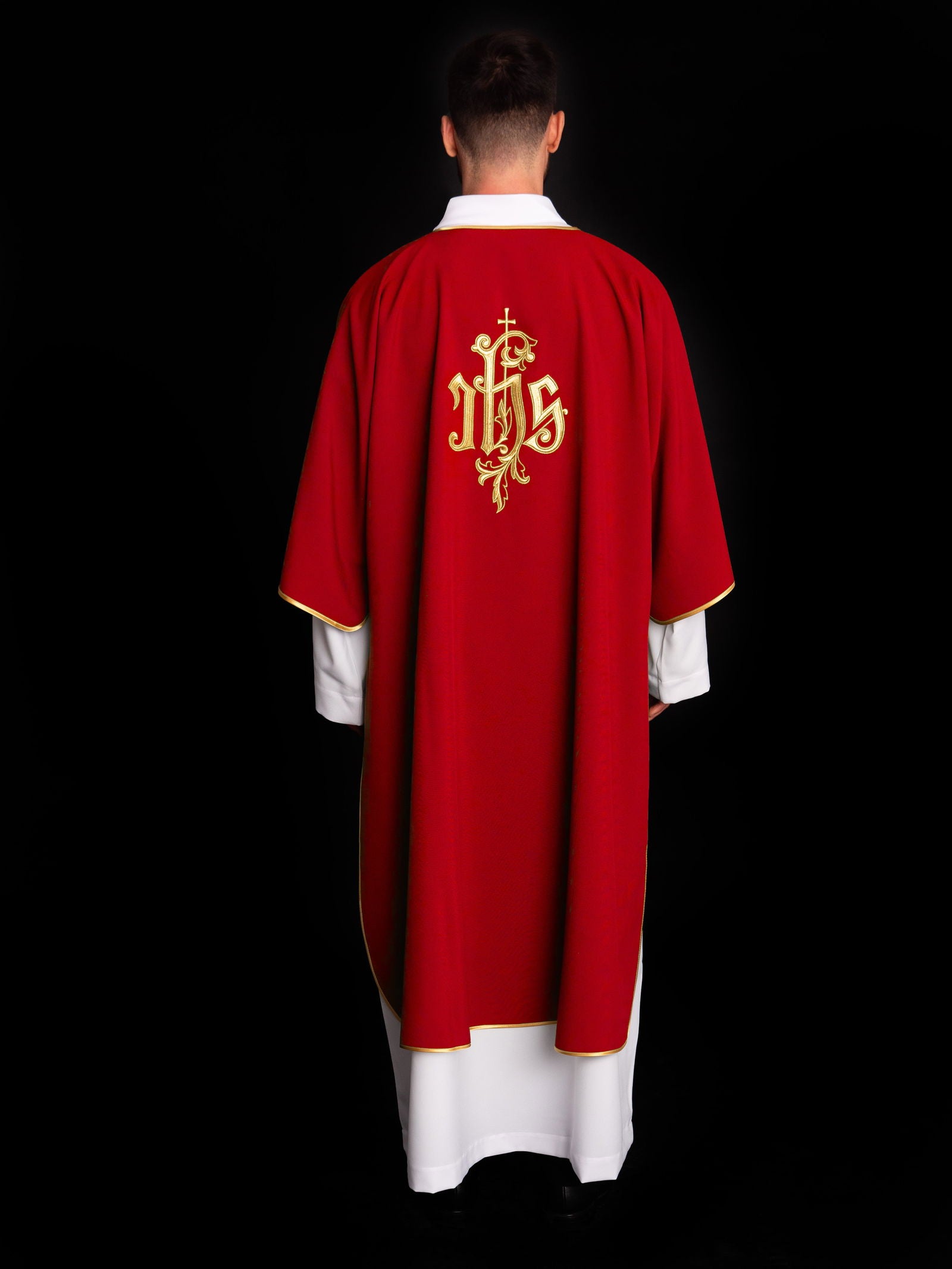 Red dalmatic chasuble with gold IHS