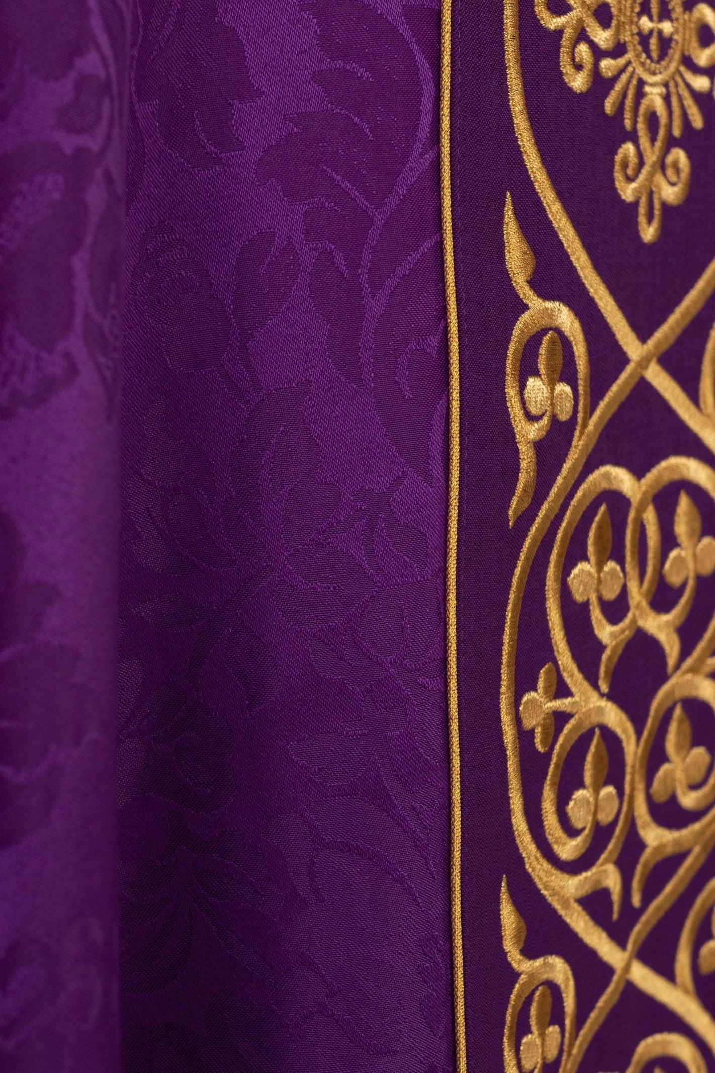 Purple liturgical chasuble decorated with velvet belt with embroidery