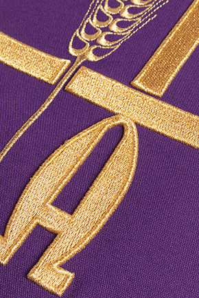 Purple chasuble with cross and alfa omega symbols