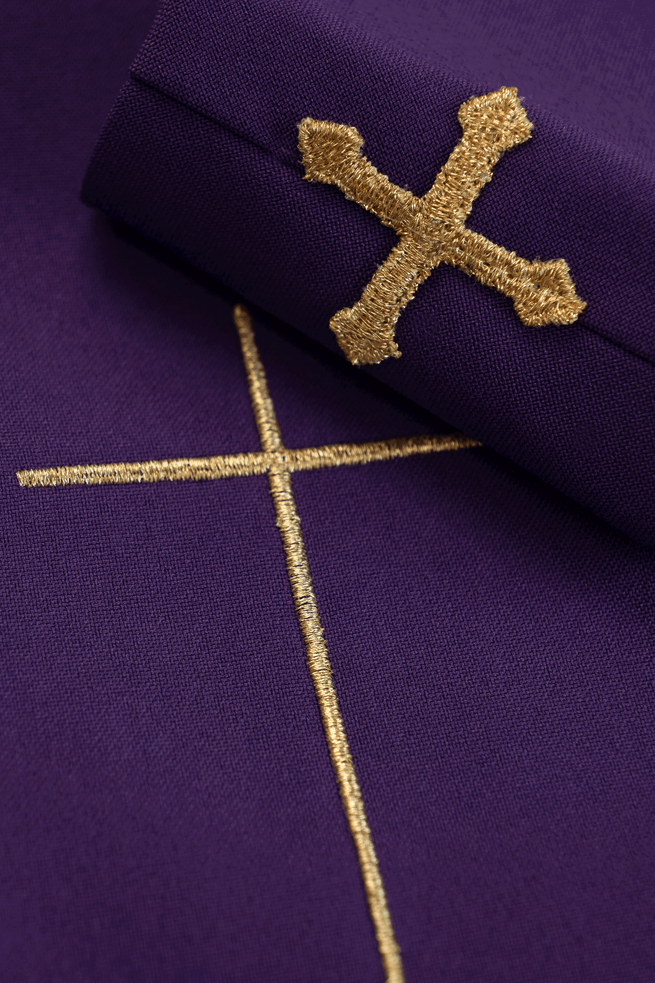 Purple chasuble with IHS and PAX embroidery