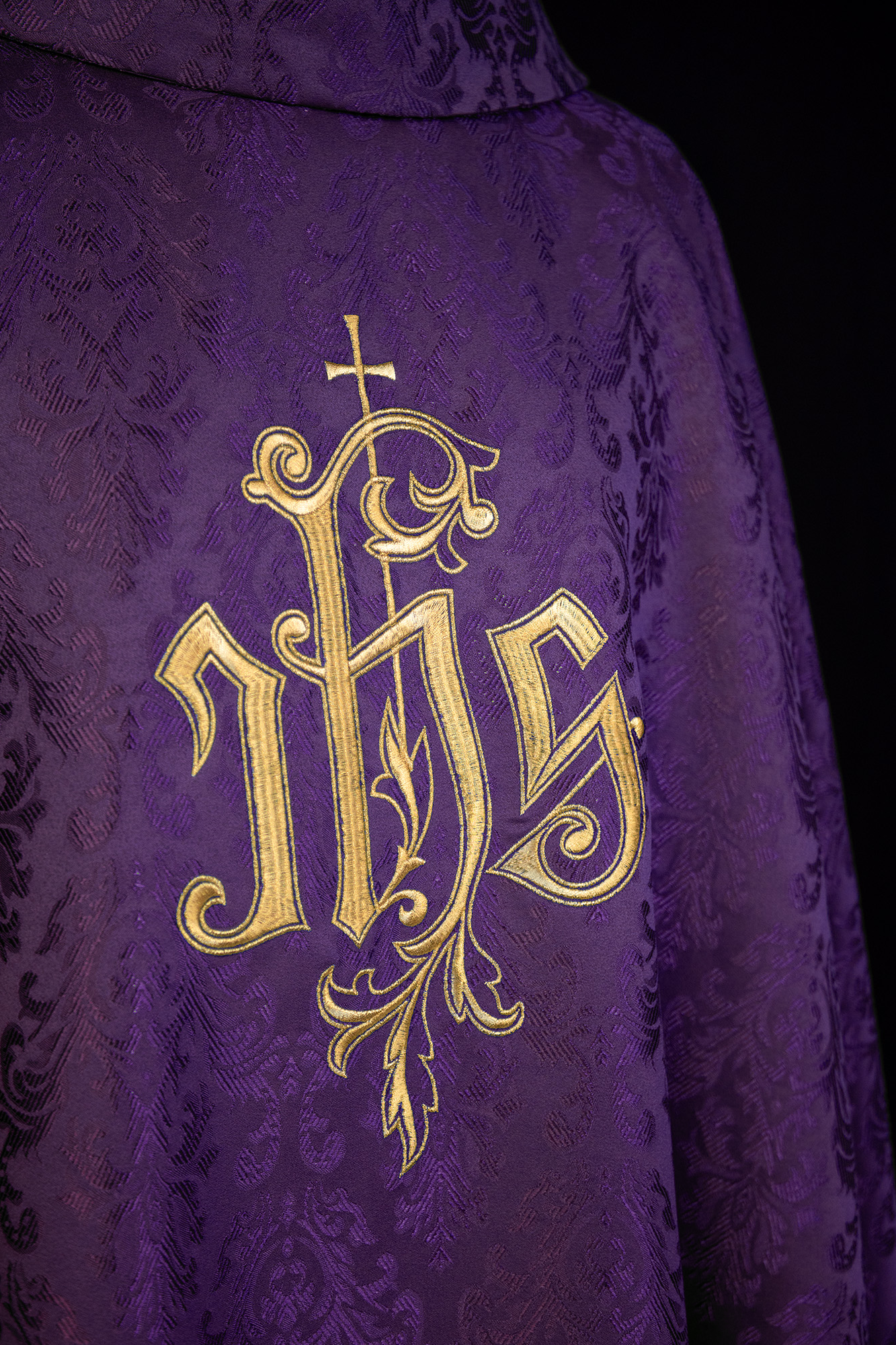 Purple chasuble made of floral ornamental texture with classic IHS