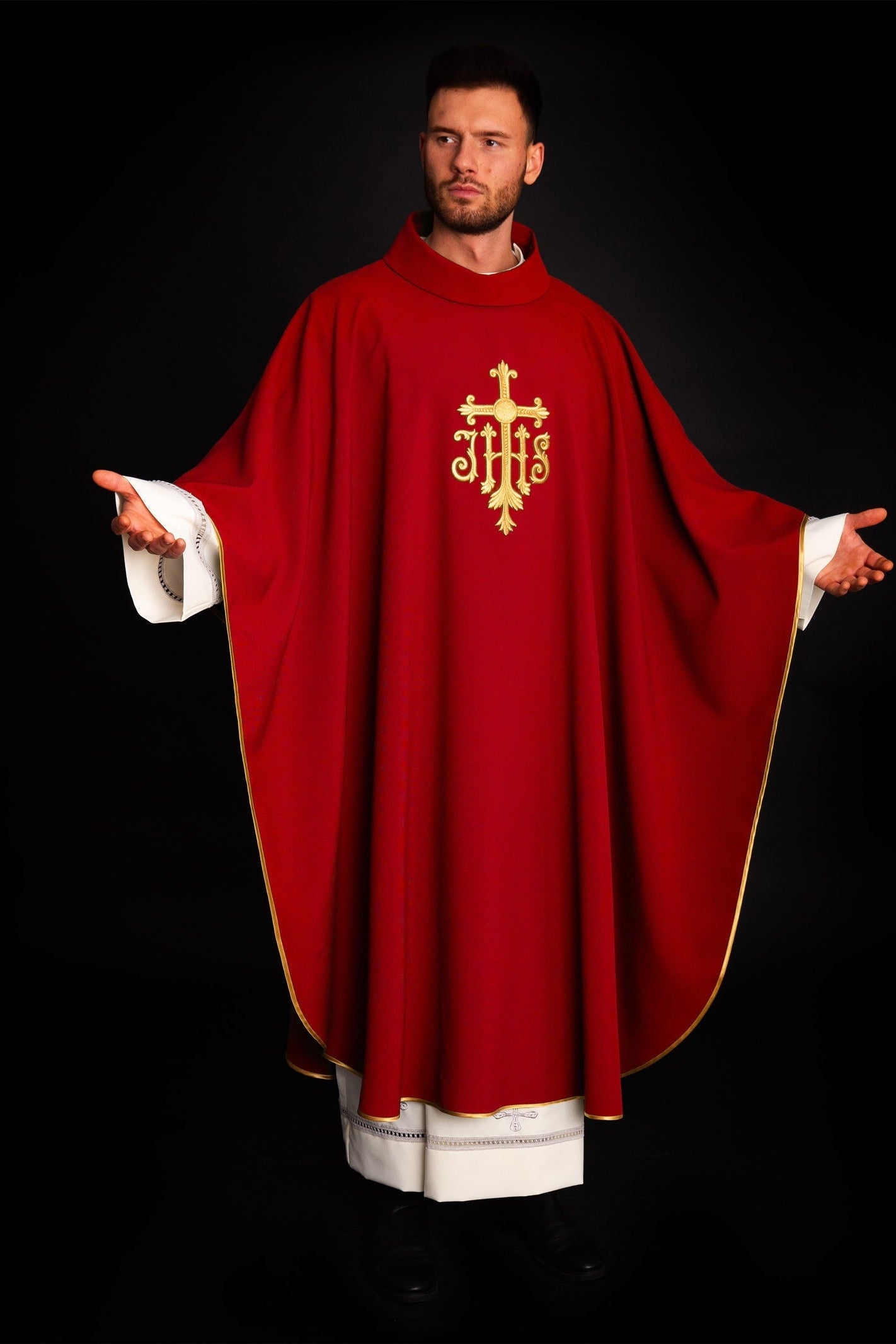 Chasuble embroidered with IHS symbol in red