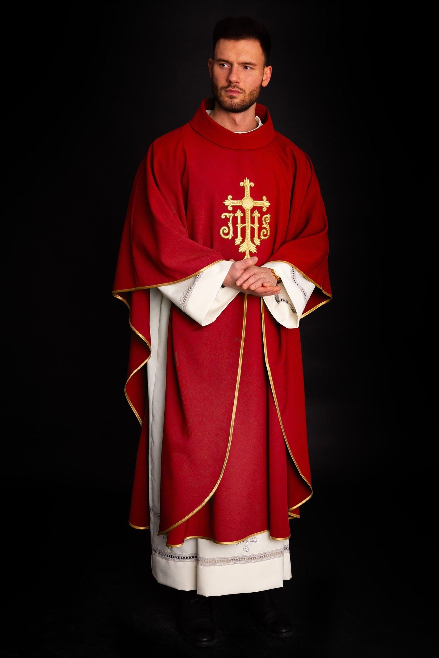 Chasuble embroidered with IHS symbol in red