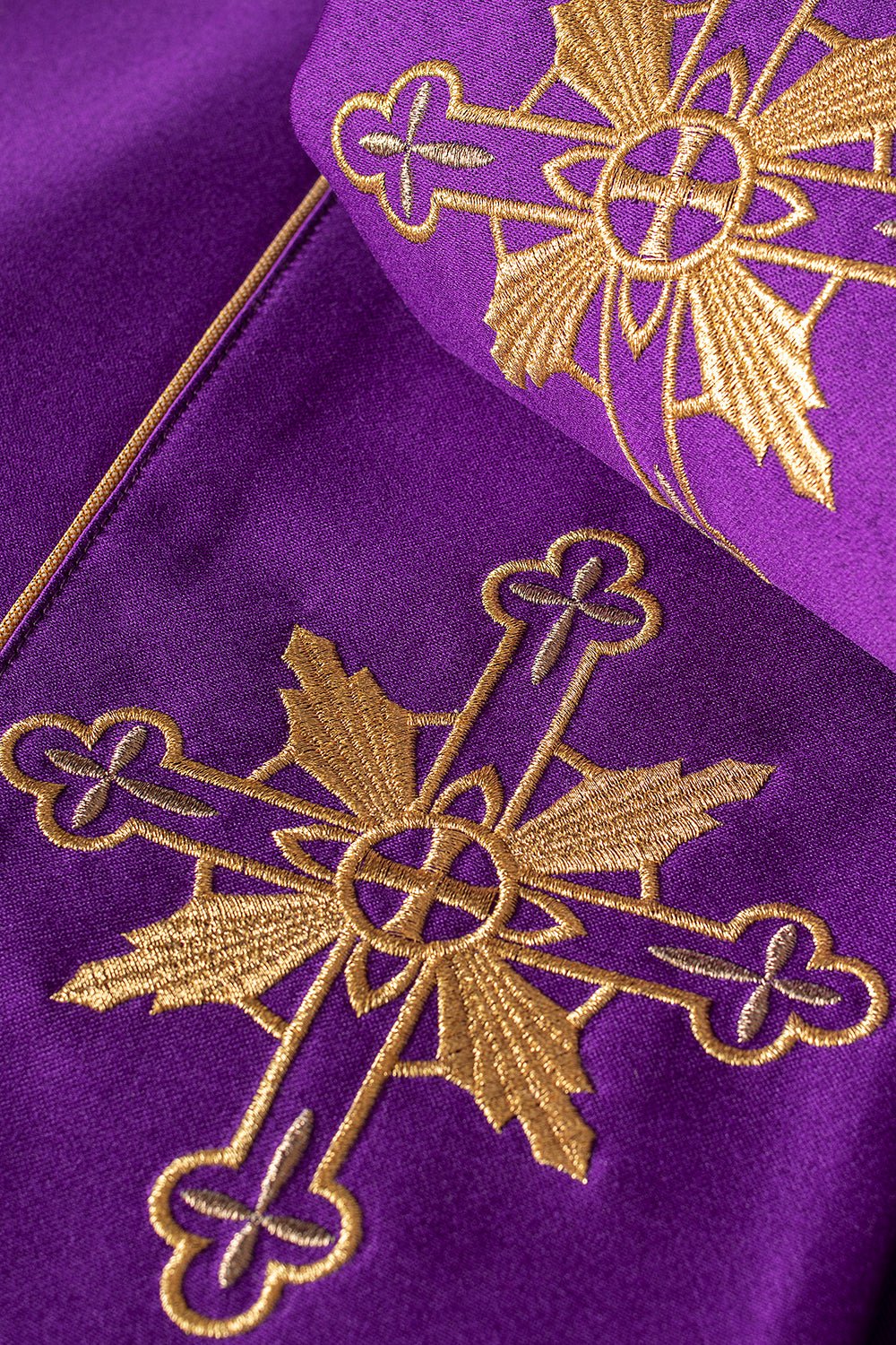 Purple liturgical cope with JHS symbol